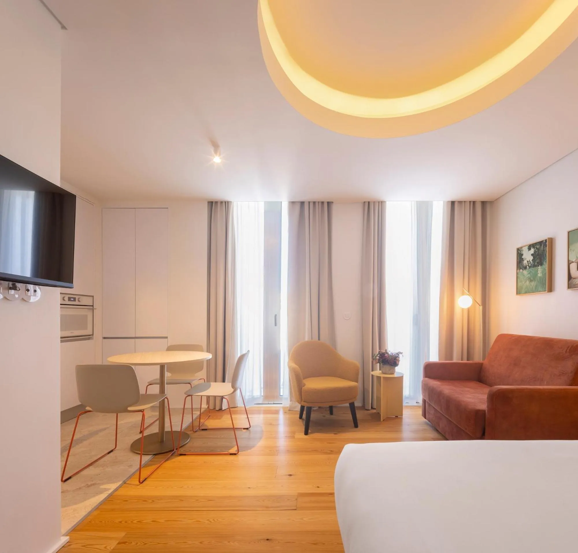 Living room, Bed in Lisbon Serviced Apartments - Estrela