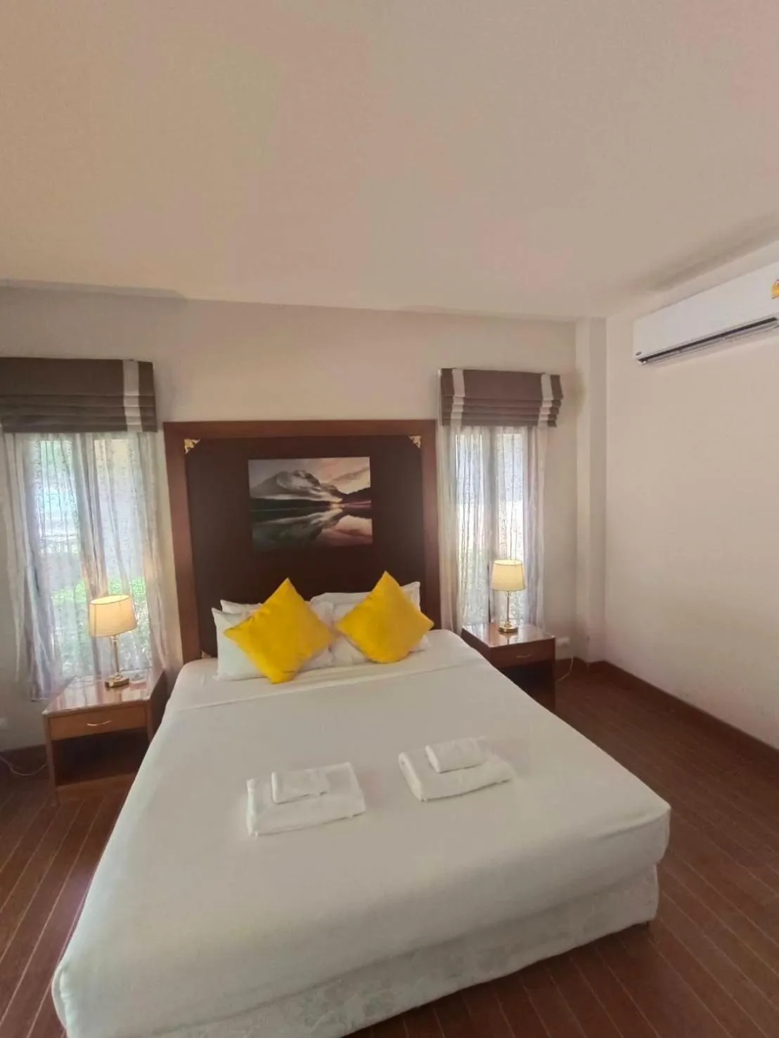 Bed in Chaithalay Khanom Resort