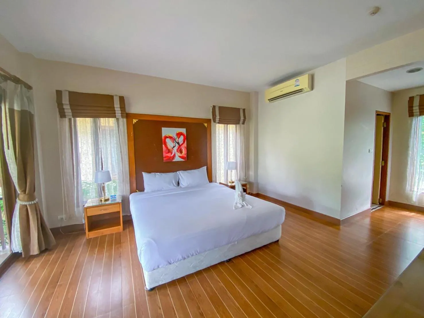 Bed in Chaithalay Khanom Resort