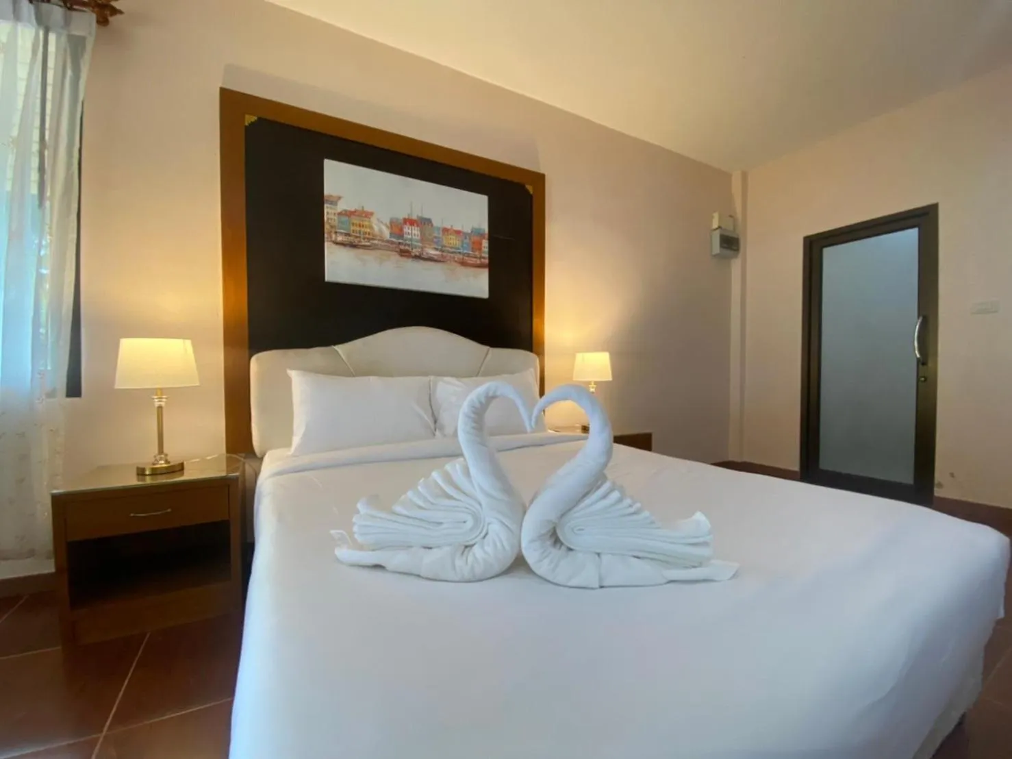 Bed in Chaithalay Khanom Resort