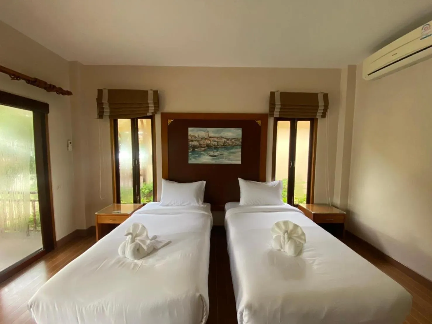 Bed in Chaithalay Khanom Resort