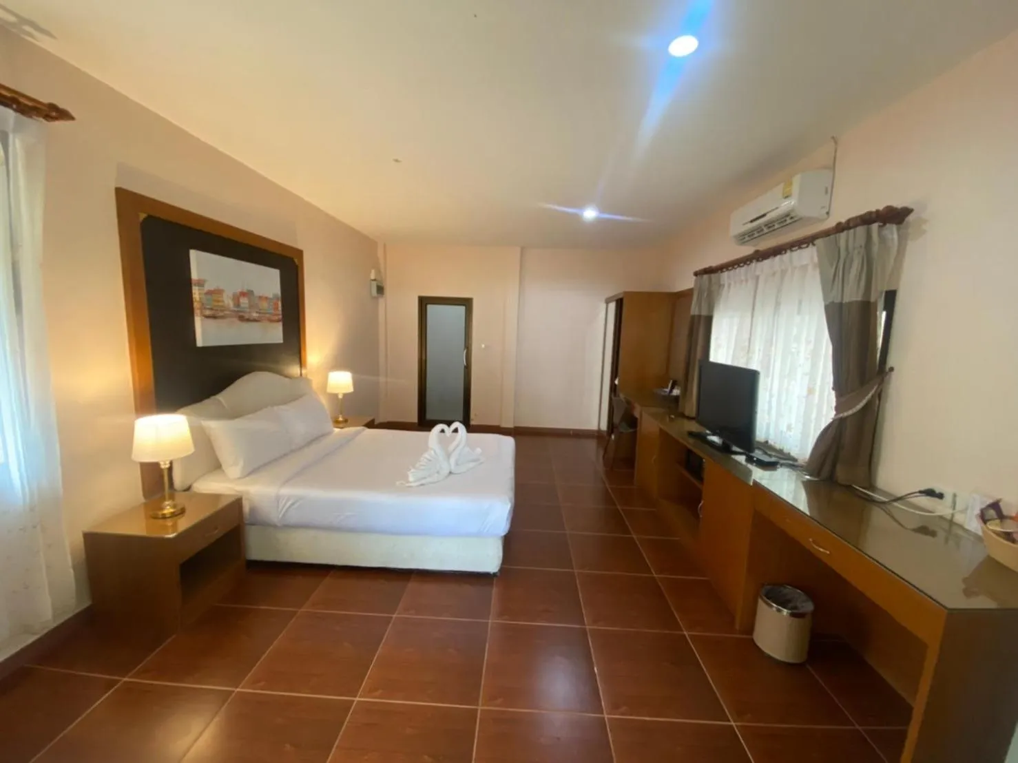 Bed in Chaithalay Khanom Resort