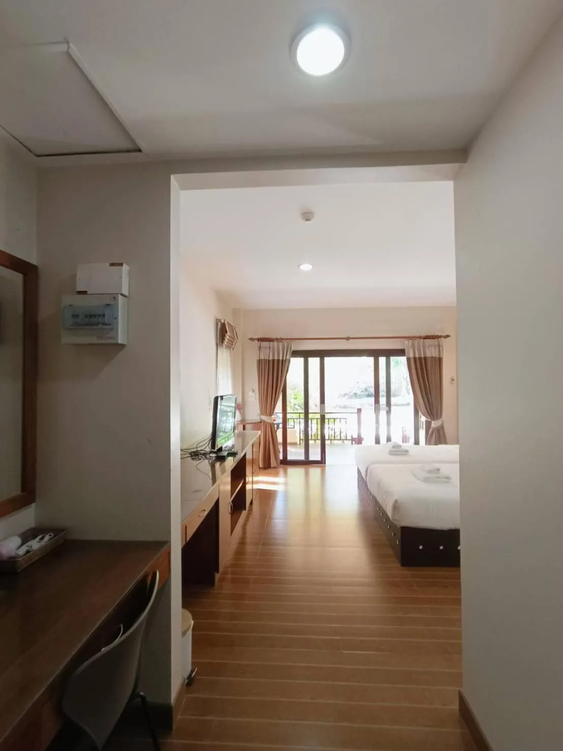 Bed in Chaithalay Khanom Resort