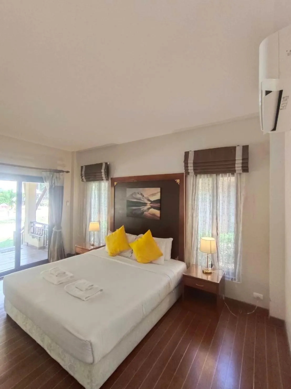 Bed in Chaithalay Khanom Resort