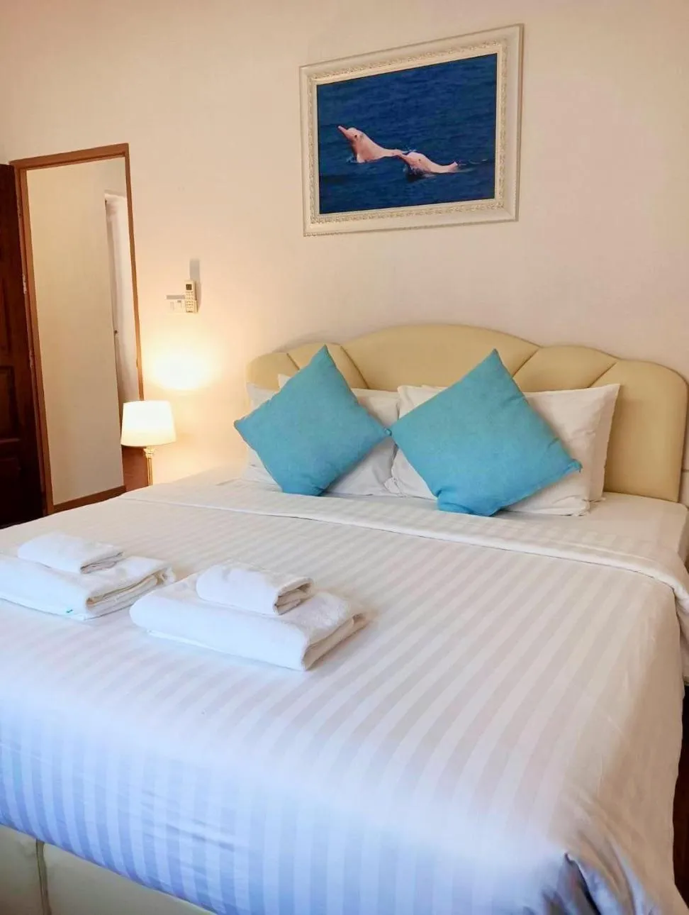 Bed in Chaithalay Khanom Resort