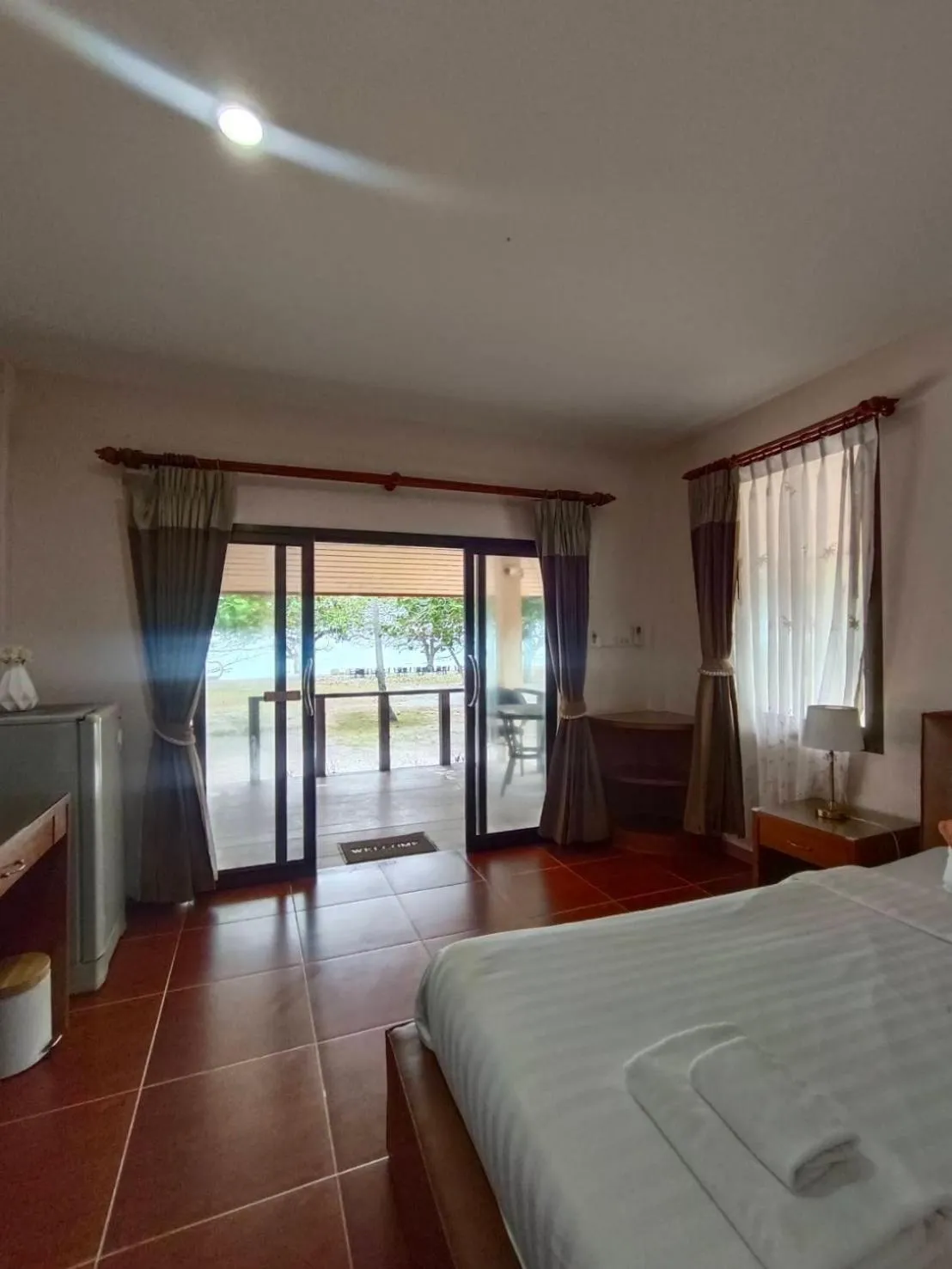 Bed in Chaithalay Khanom Resort