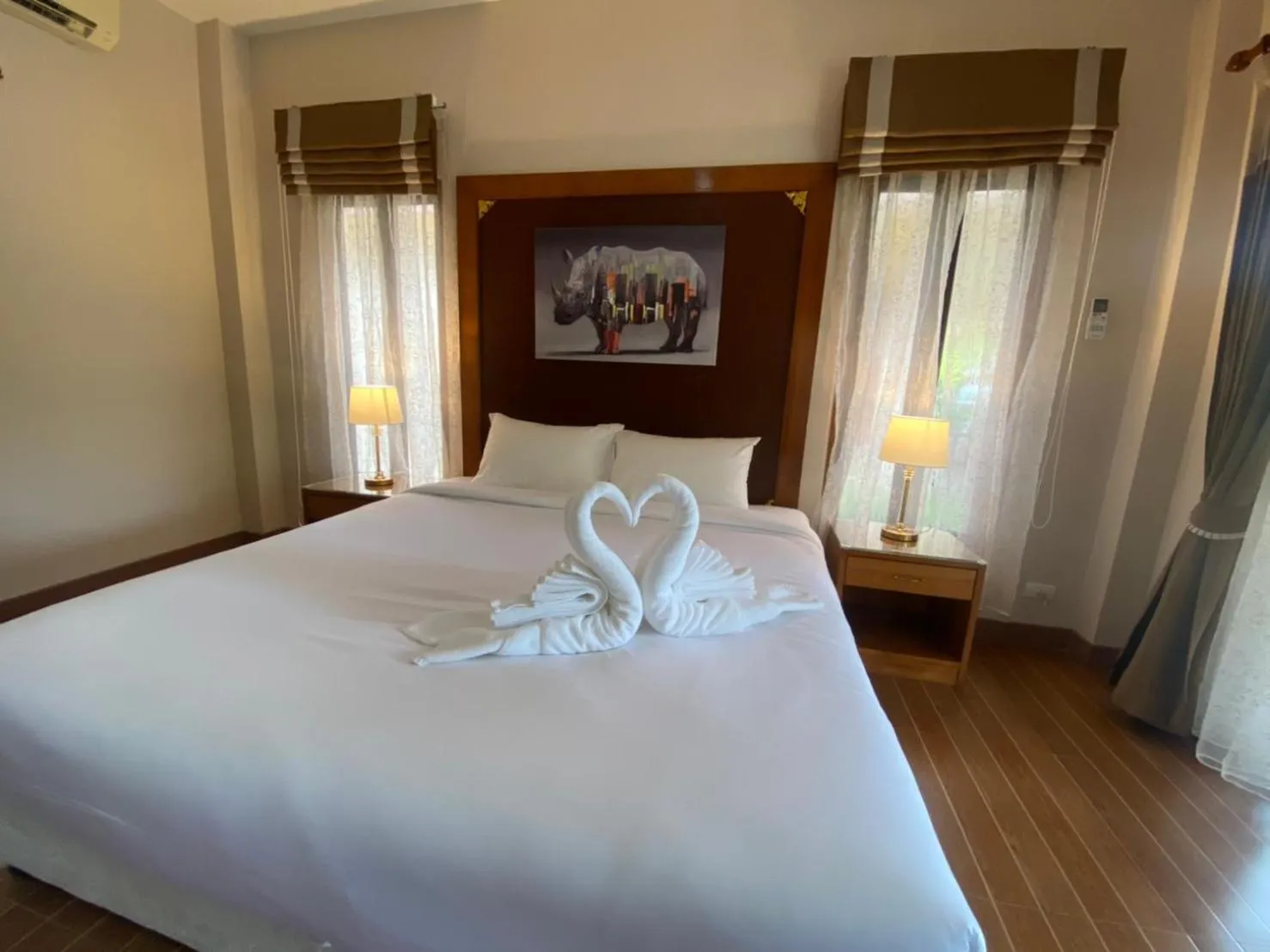 Bed in Chaithalay Khanom Resort