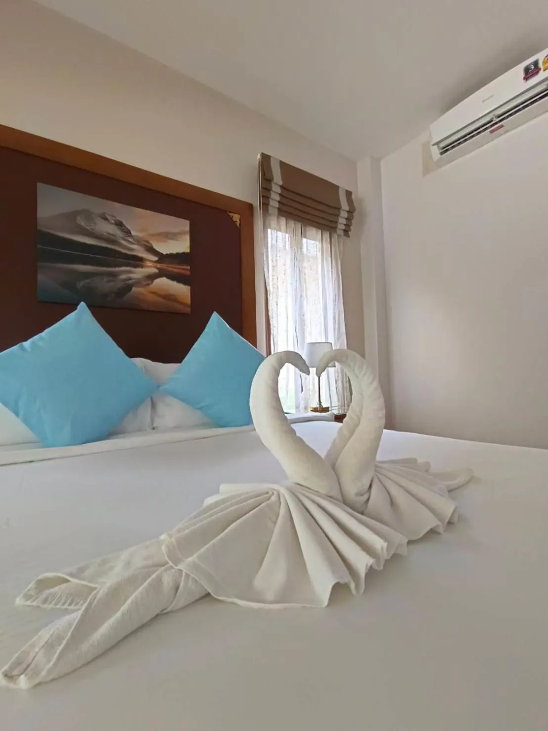 Bed in Chaithalay Khanom Resort