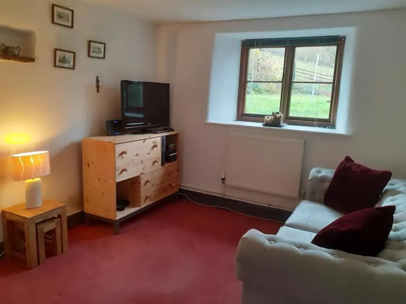 Communal lounge/ TV room in Witherhill Granary