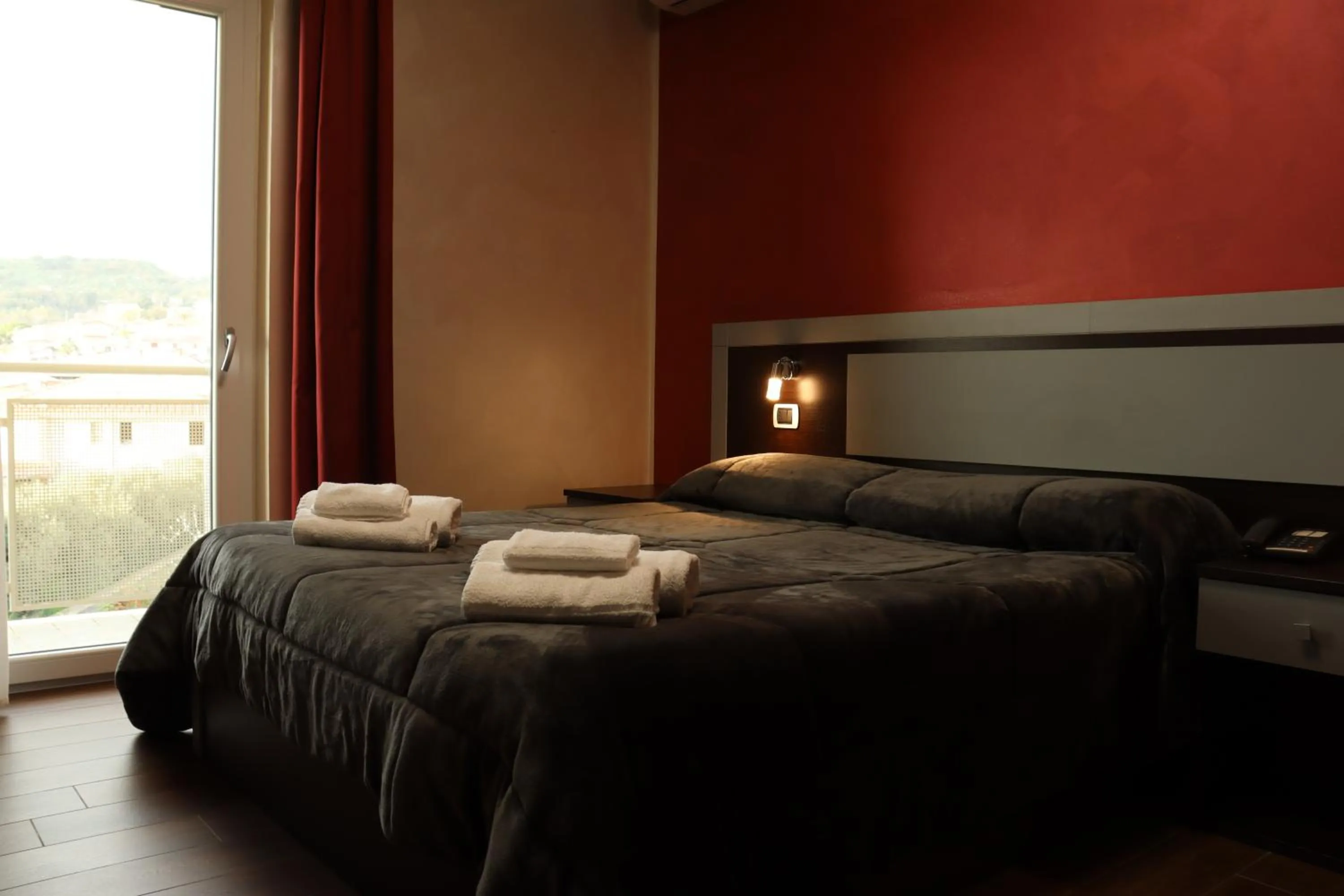 Bed in Hotel Paradiso