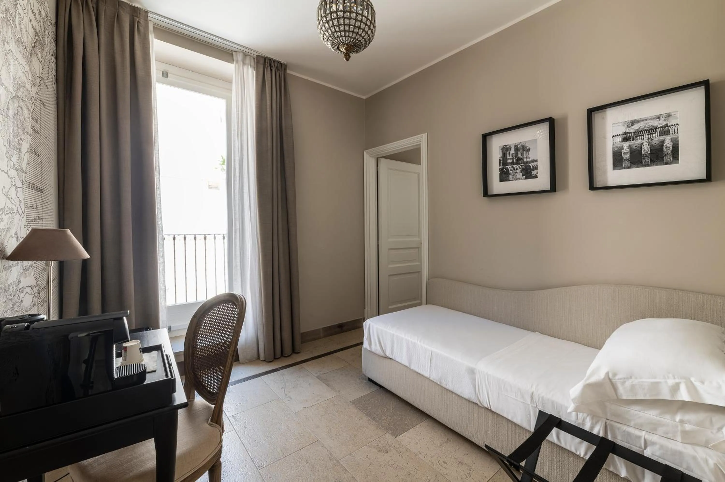 Bed in La Dépendance Hotel