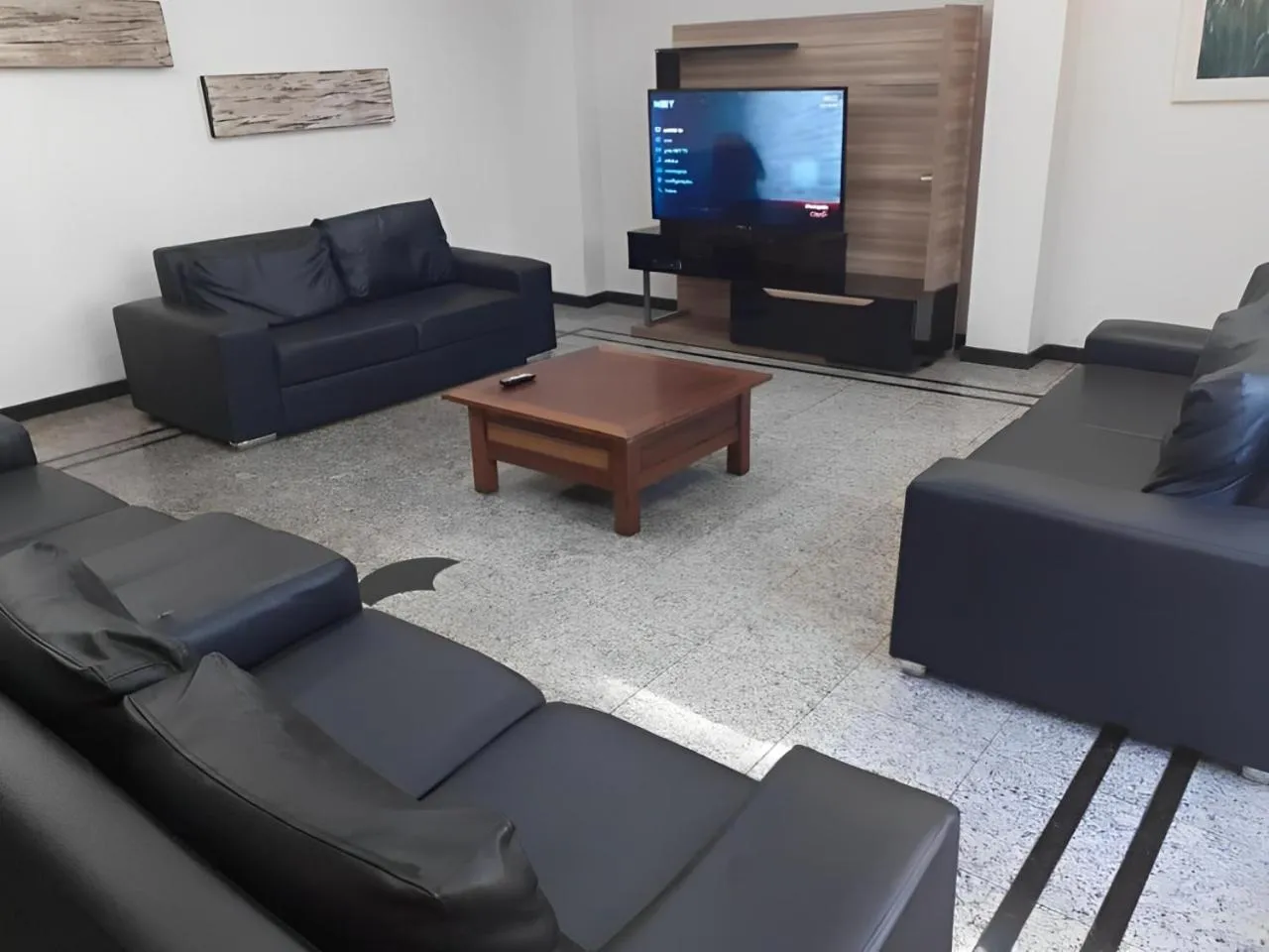 Communal lounge/ TV room in Hotel Tenda