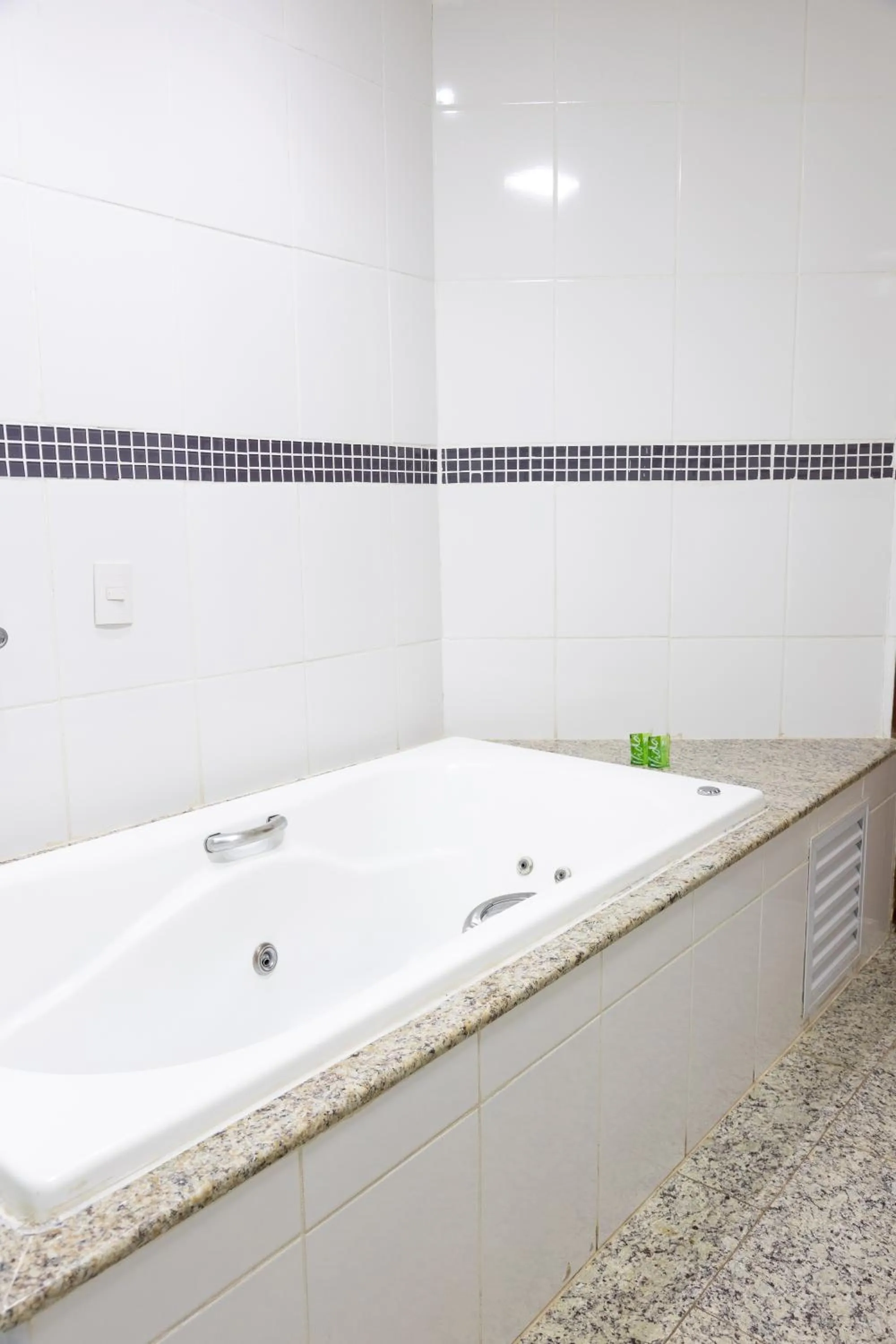 Bathroom in BOMBONATO PALACE HOTEL