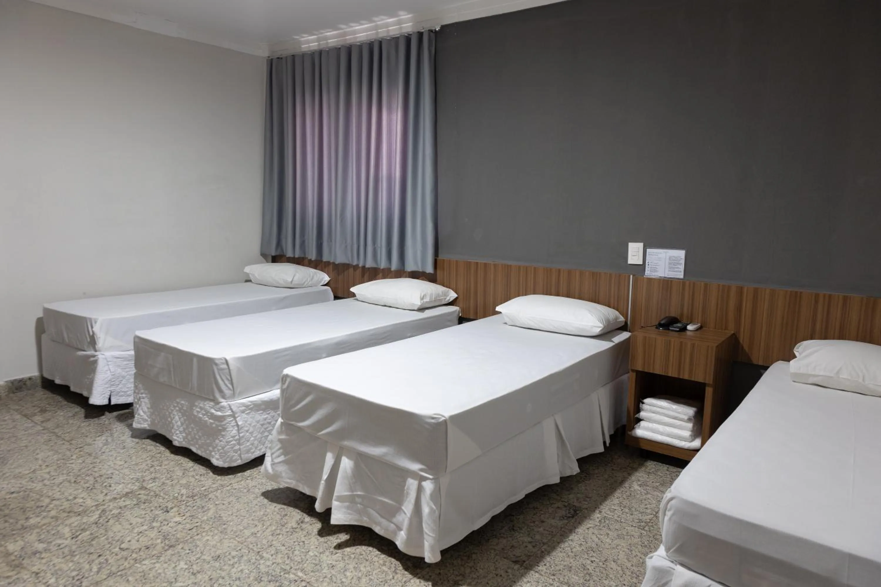 Bed in BOMBONATO PALACE HOTEL