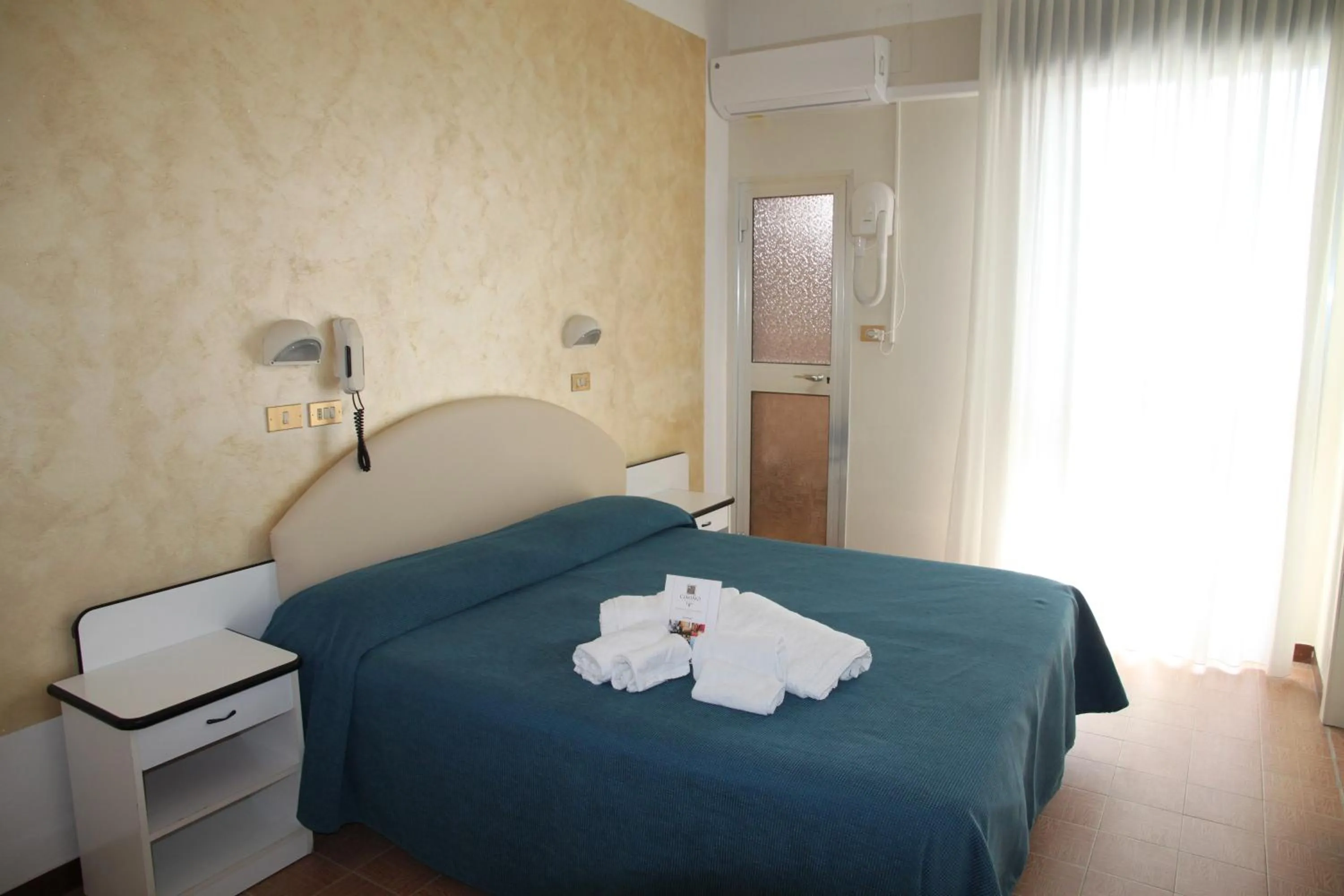 Bed in Hotel Adriatica sul Mare