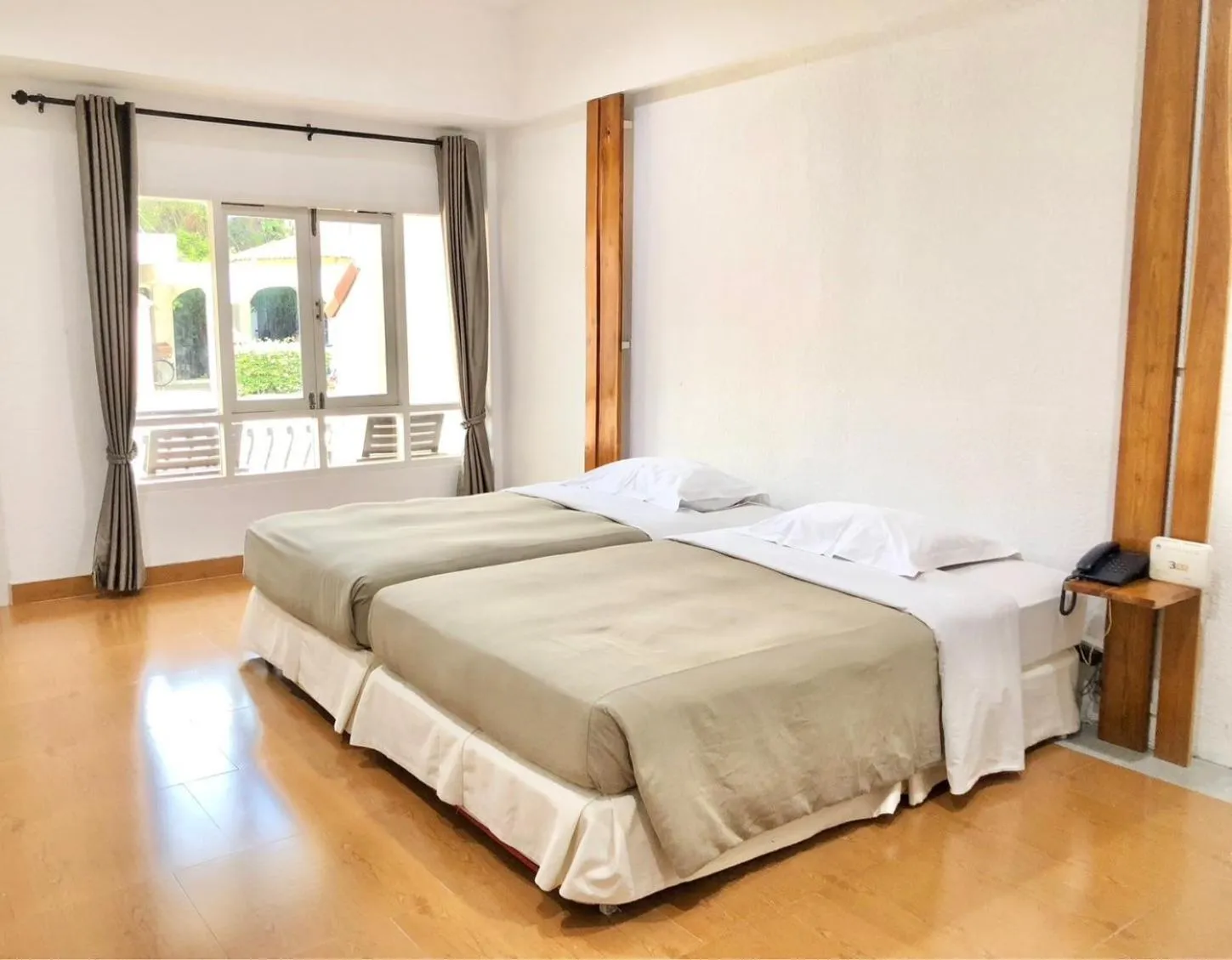 Bed in Dad D Resort by Lopburi Inn Resort