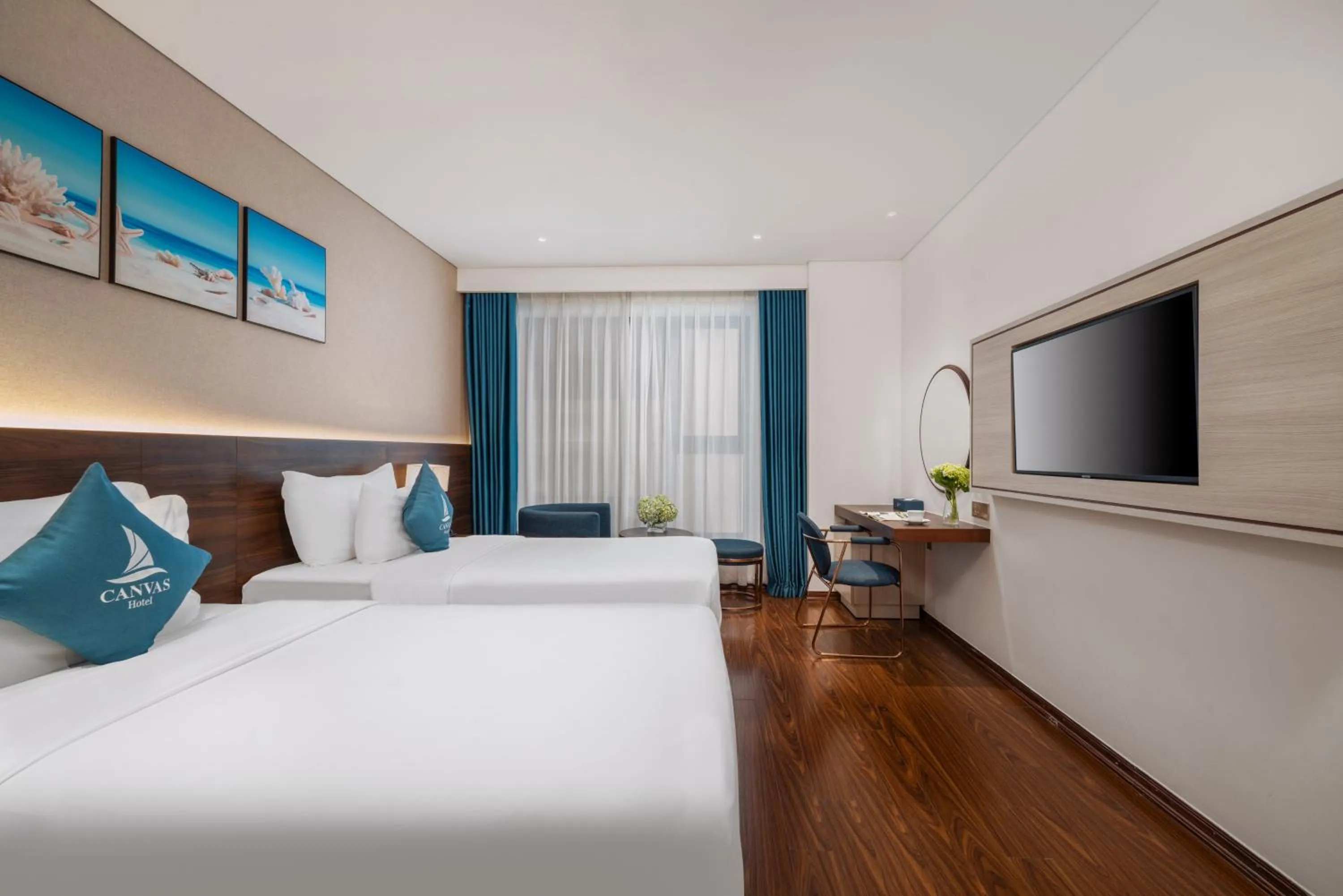 Bed in Canvas Danang Beach Hotel