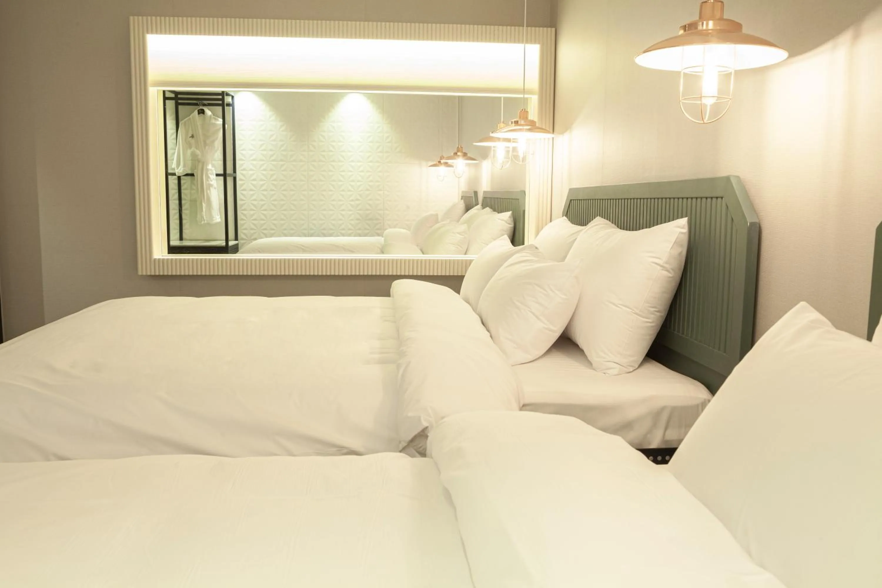 Bed in Sinan Equelim Hotel