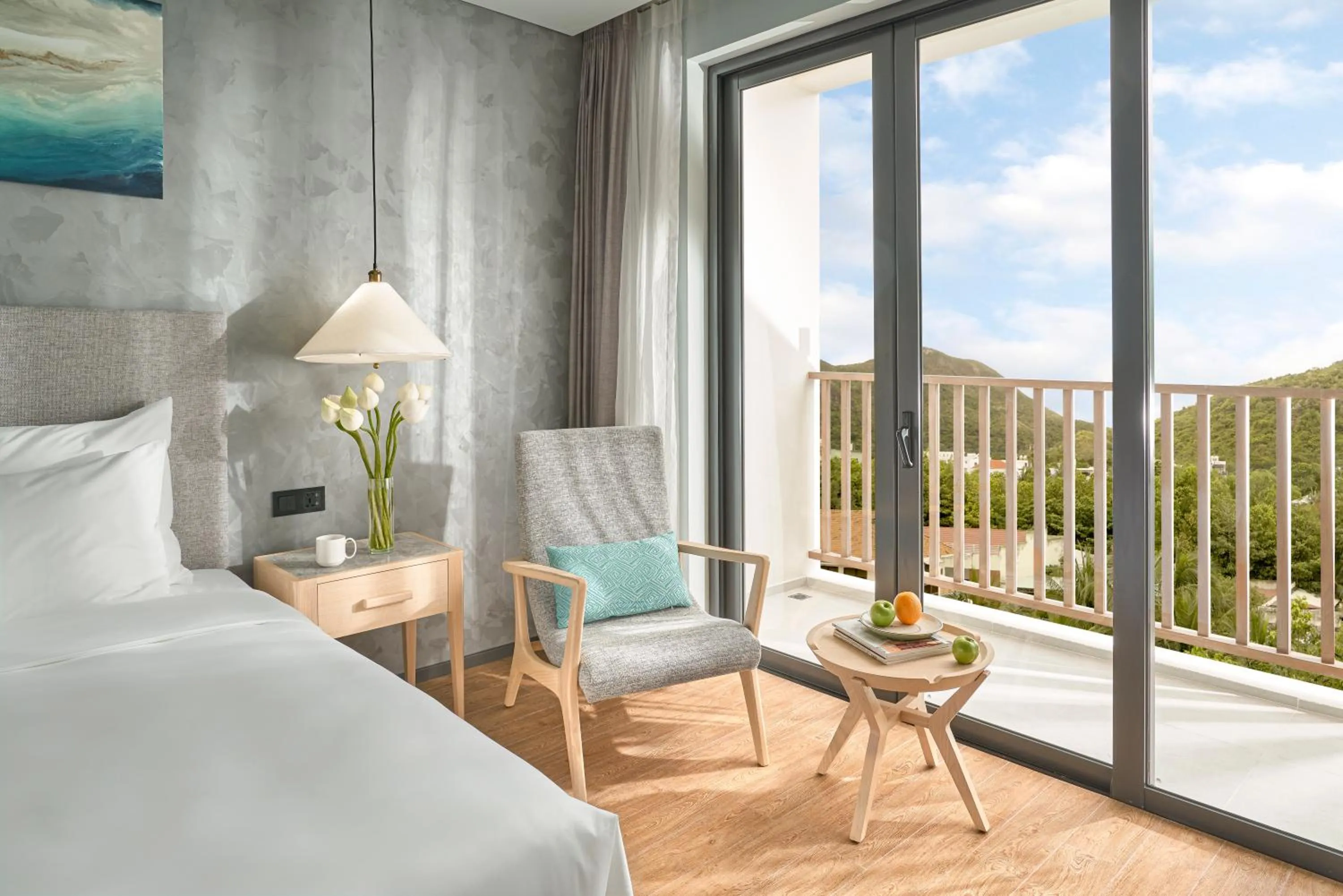 Seating area, Bed in The Secret Con Dao