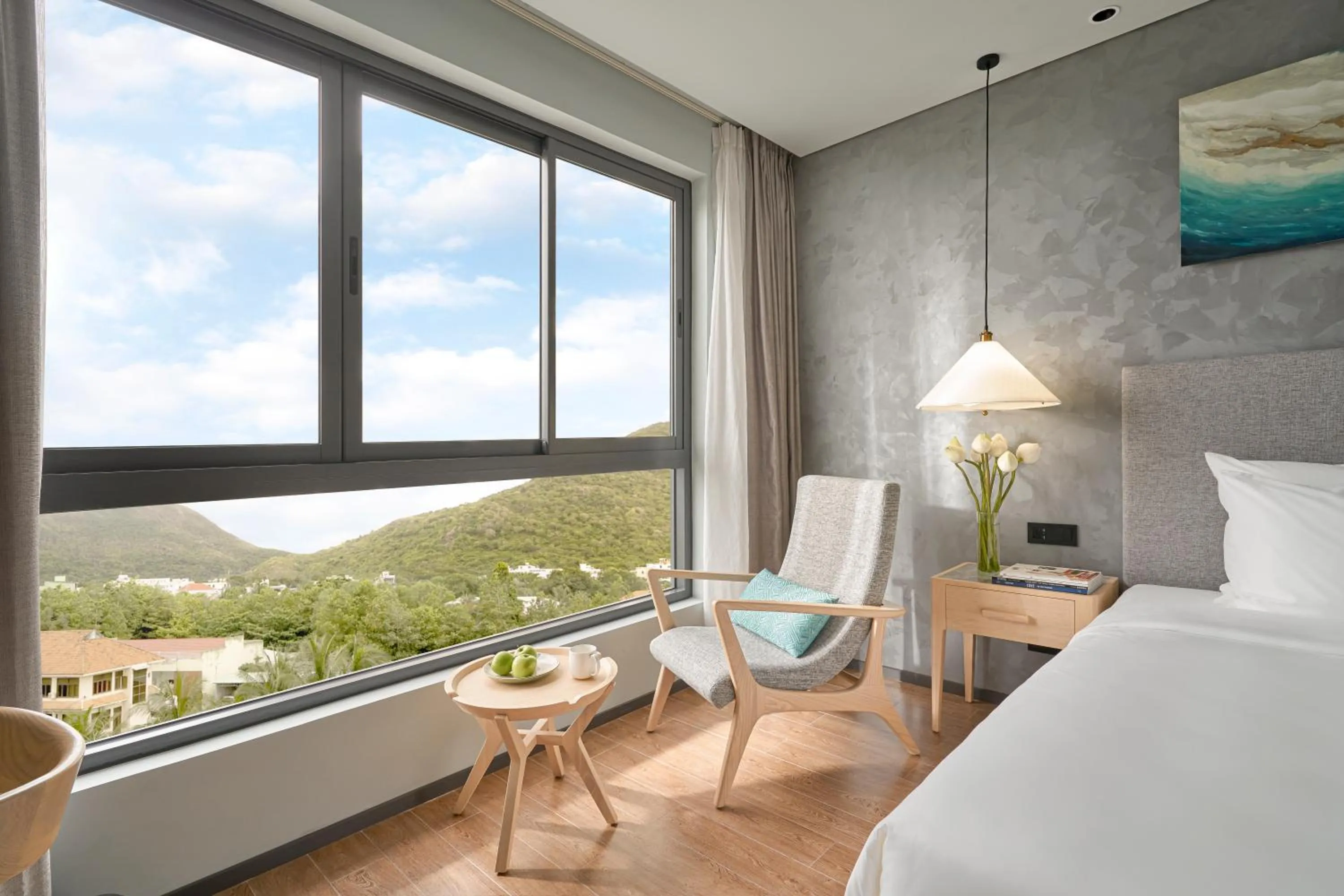 Seating area, Bed in The Secret Con Dao