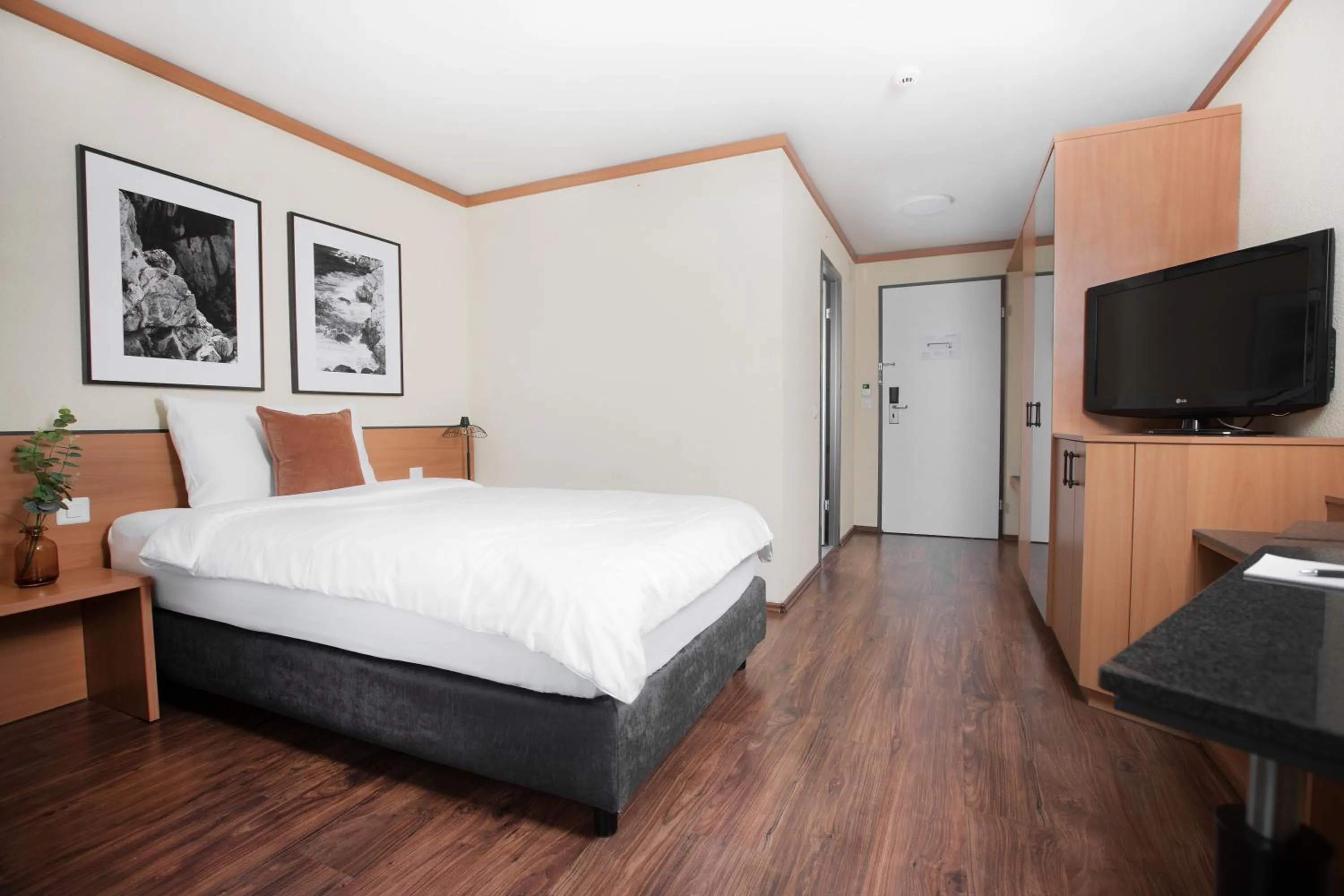 Bedroom, Bed in HOTEL ENGEL LIESTAL - Business & Lifestyle