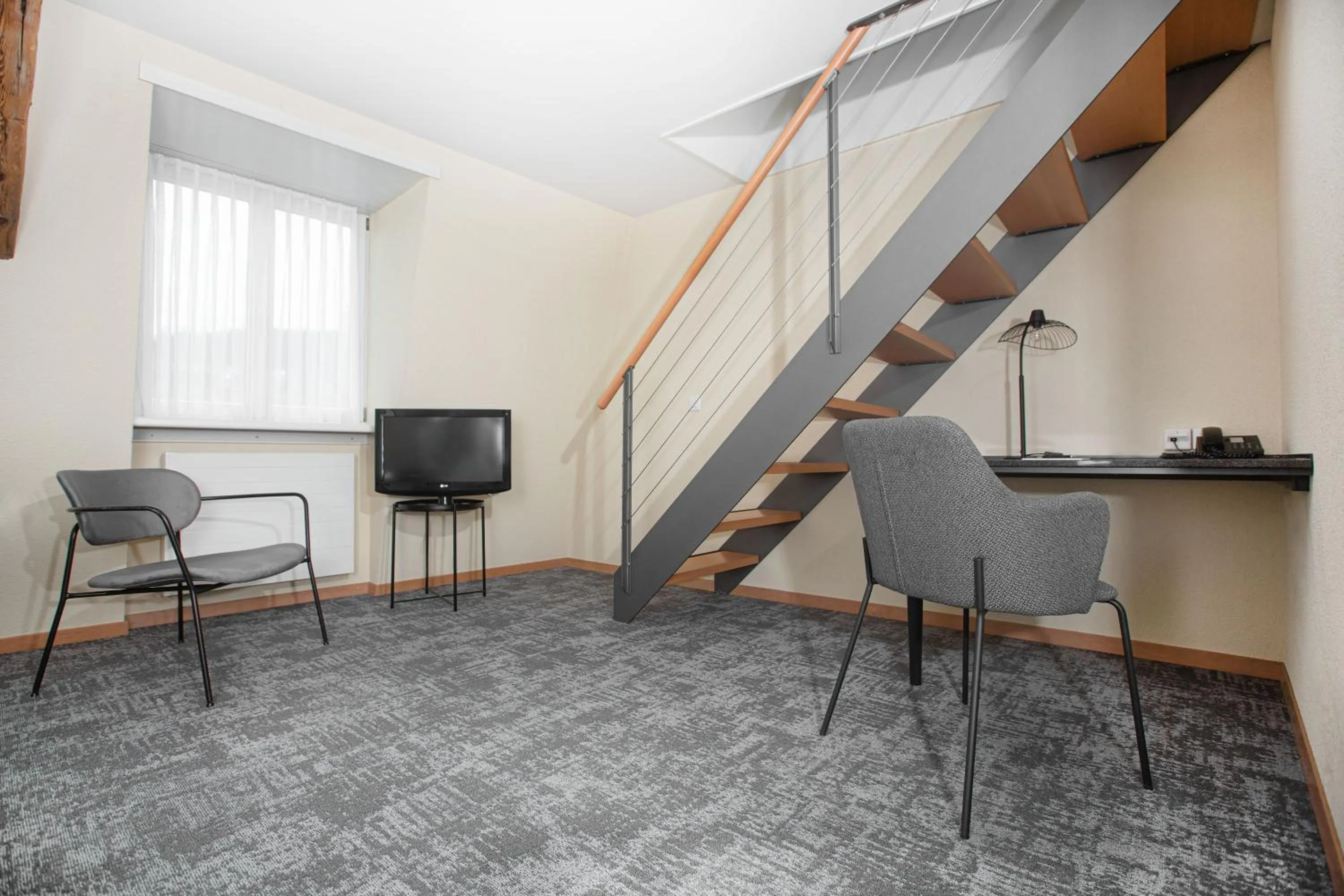 Living room in HOTEL ENGEL LIESTAL - Business & Lifestyle