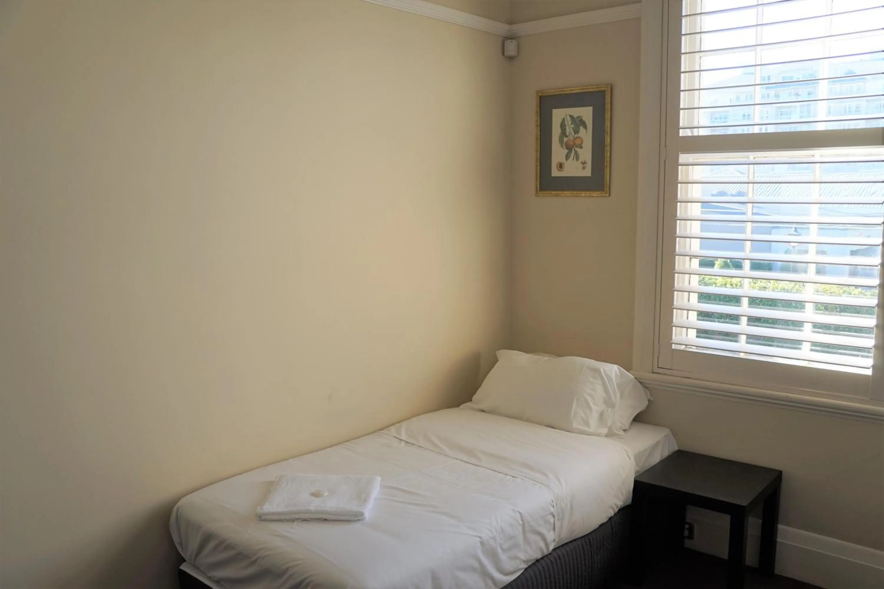 Bed in Palace Hotel Mortlake Sydney