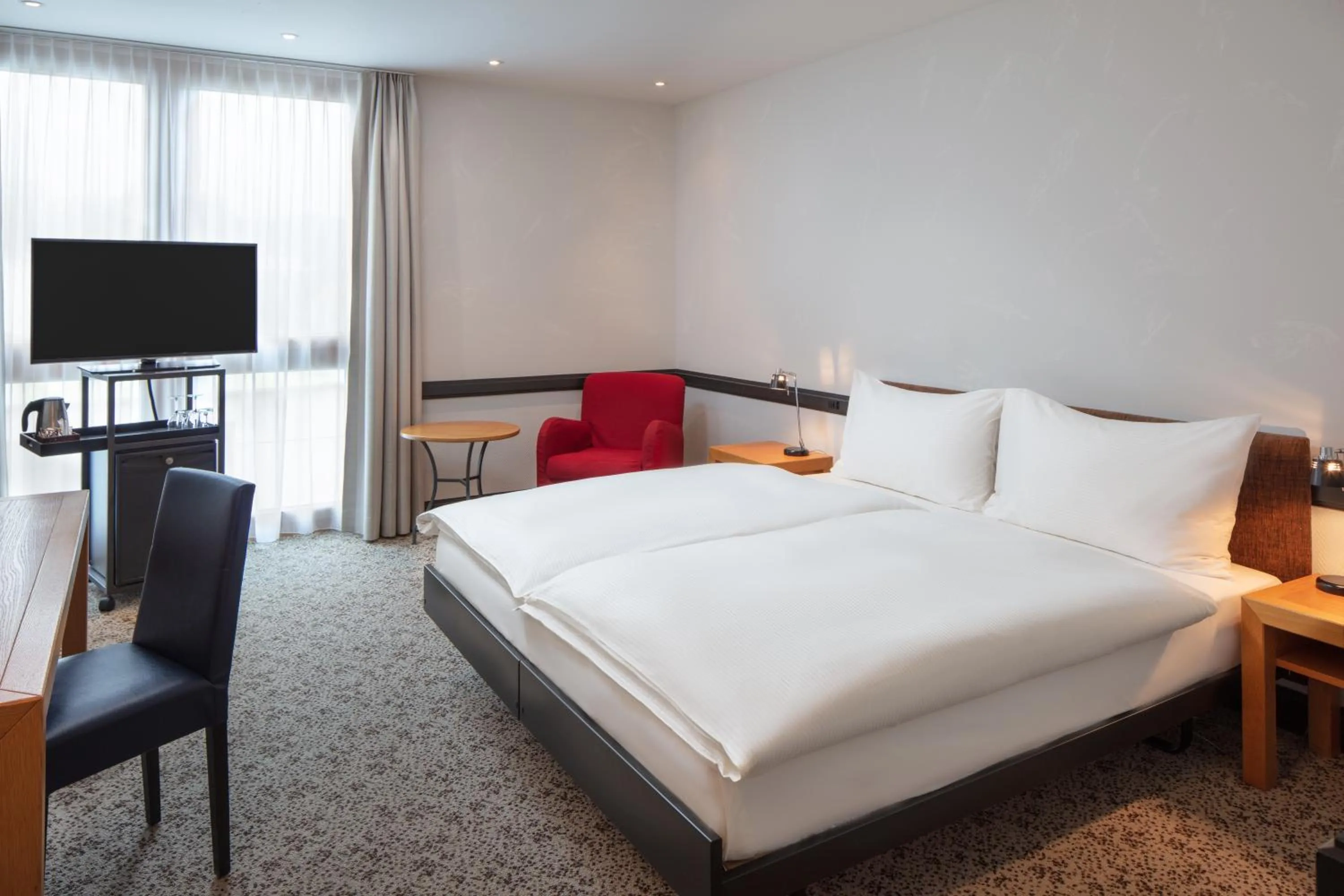 Photo of the whole room, Bed in Hotel Baslertor