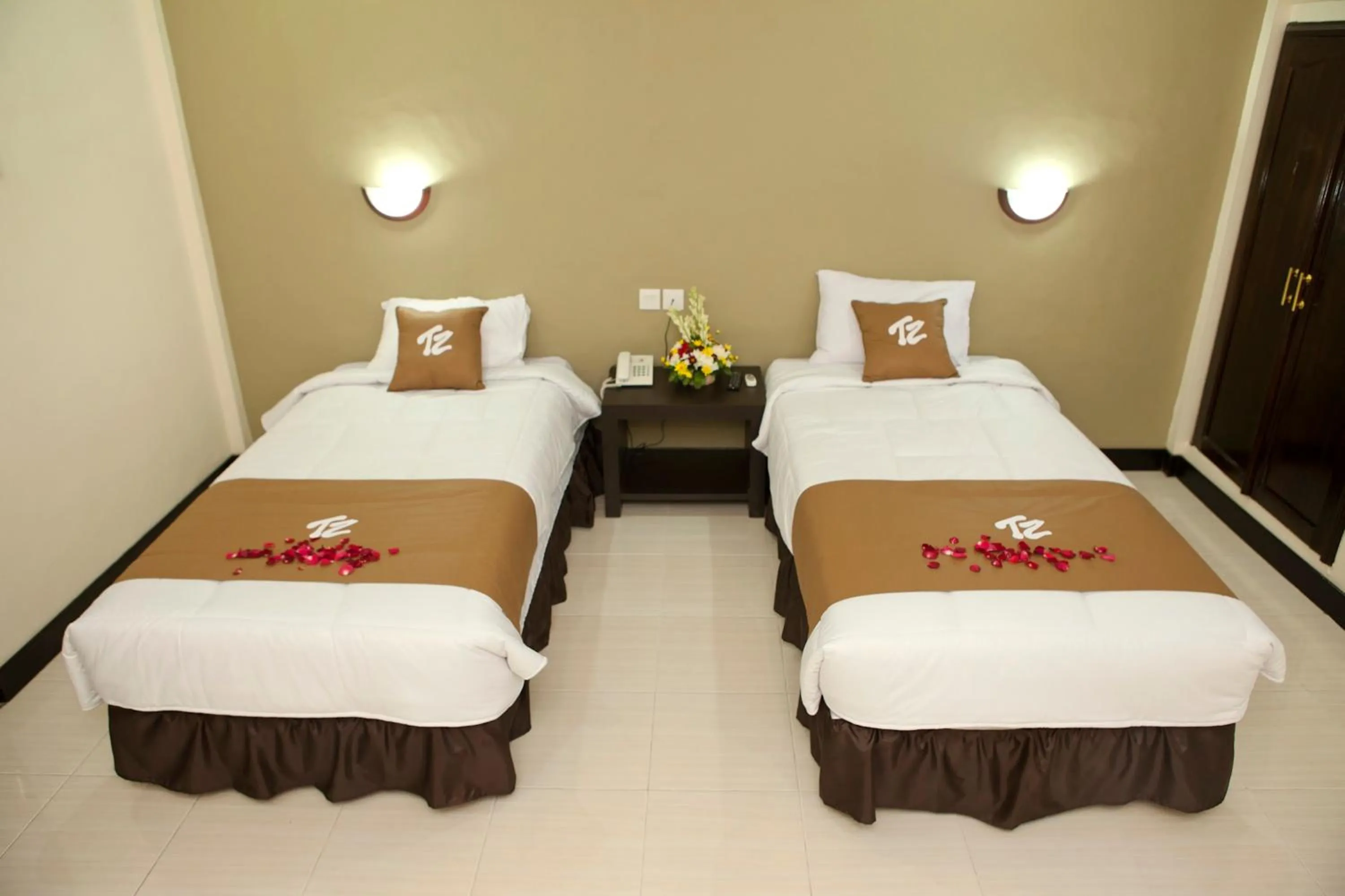 Bed in Troppo Zone Puri Rama Resort Kuta