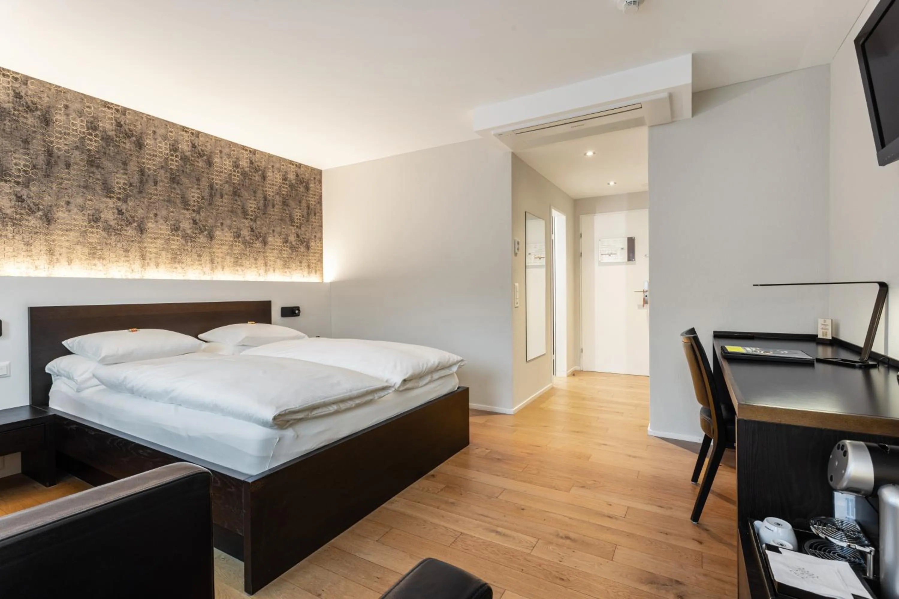 Bed in ABC Swiss Quality Hotel