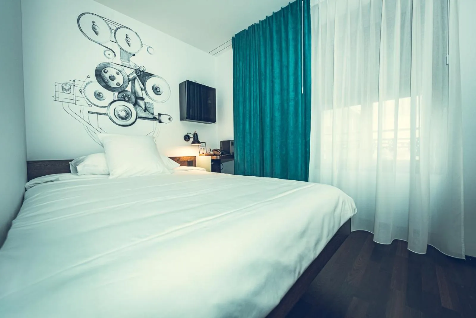 Bed in Hotel Bernina Geneva