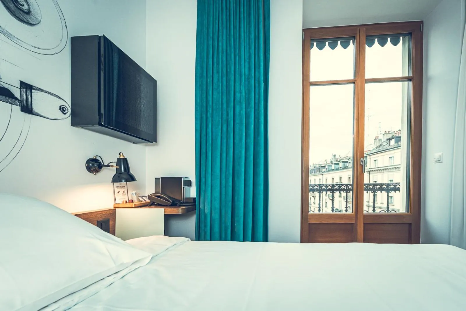 Bed in Hotel Bernina Geneva