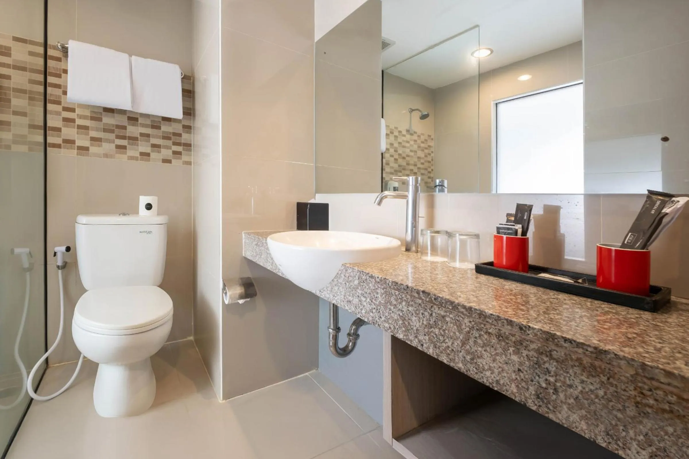 Bathroom in Hotel Neo Candi Simpang Lima - Semarang by ASTON