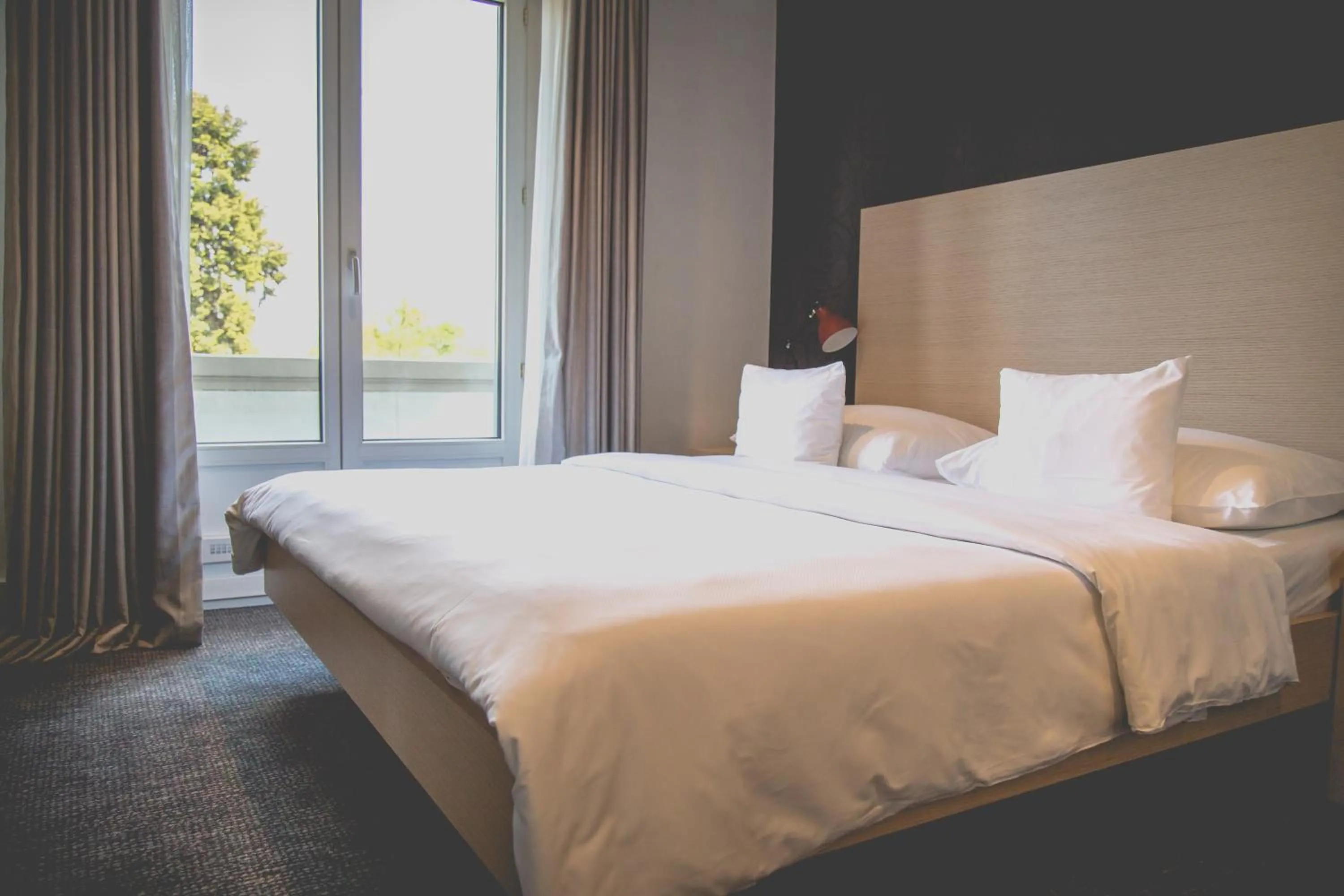 Bed in Hotel Mon Repos