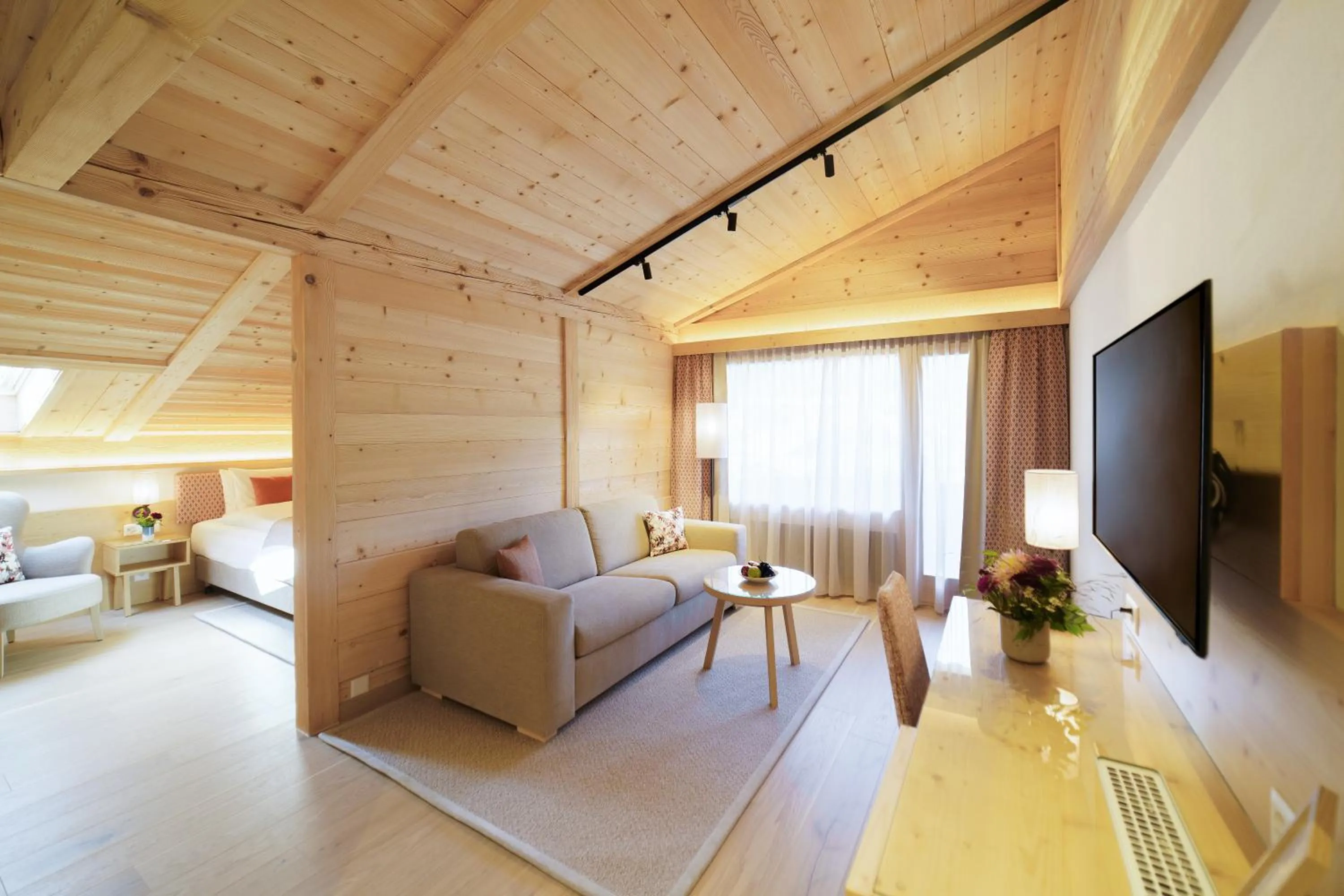 Living room, Bed in Gstaaderhof - Active & Relax Hotel