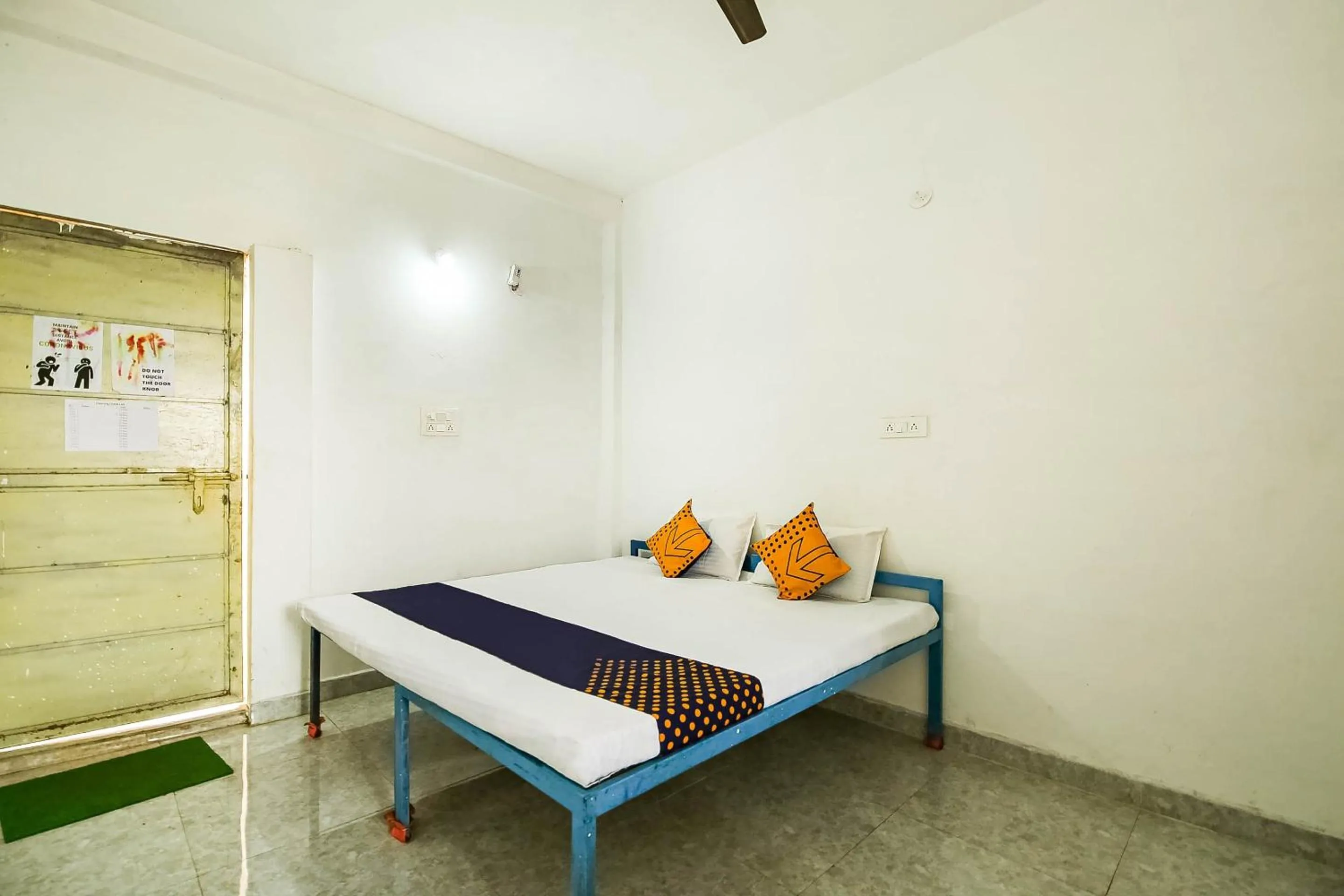 Bedroom, Bed in SPOT ON by OYO Krishna Market And Lodge