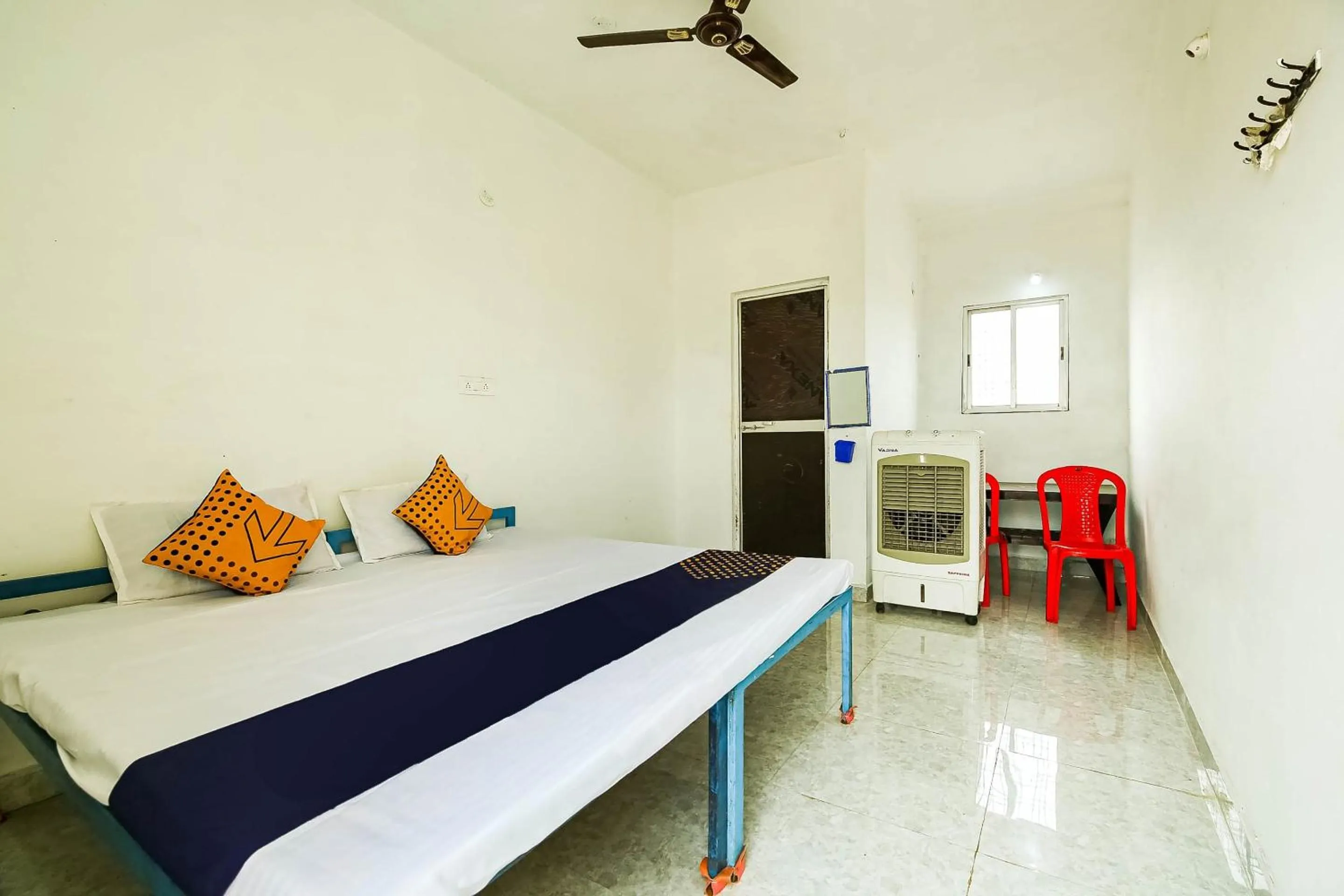 Bedroom, Bed in SPOT ON by OYO Krishna Market And Lodge