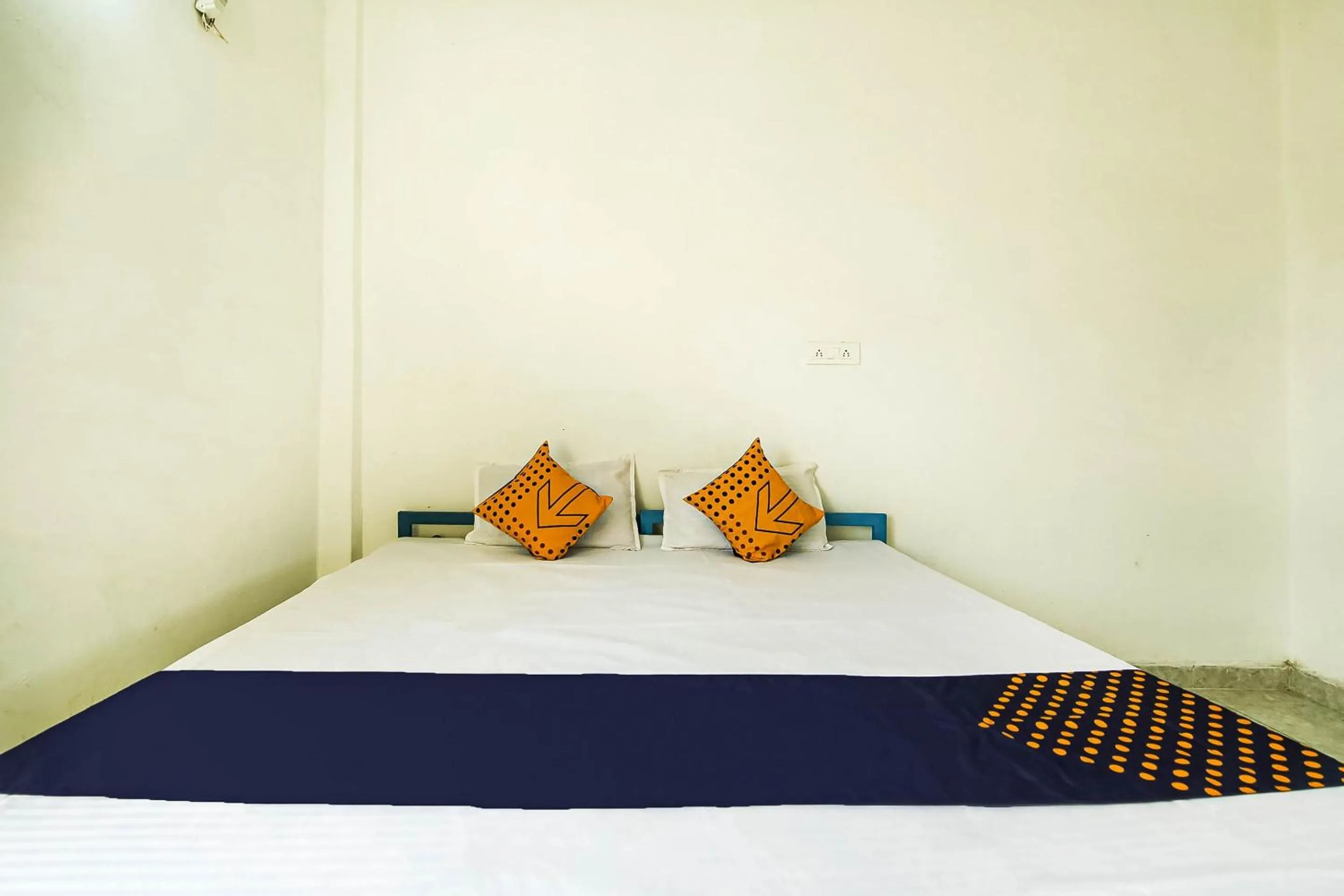 Bedroom, Bed in SPOT ON by OYO Krishna Market And Lodge