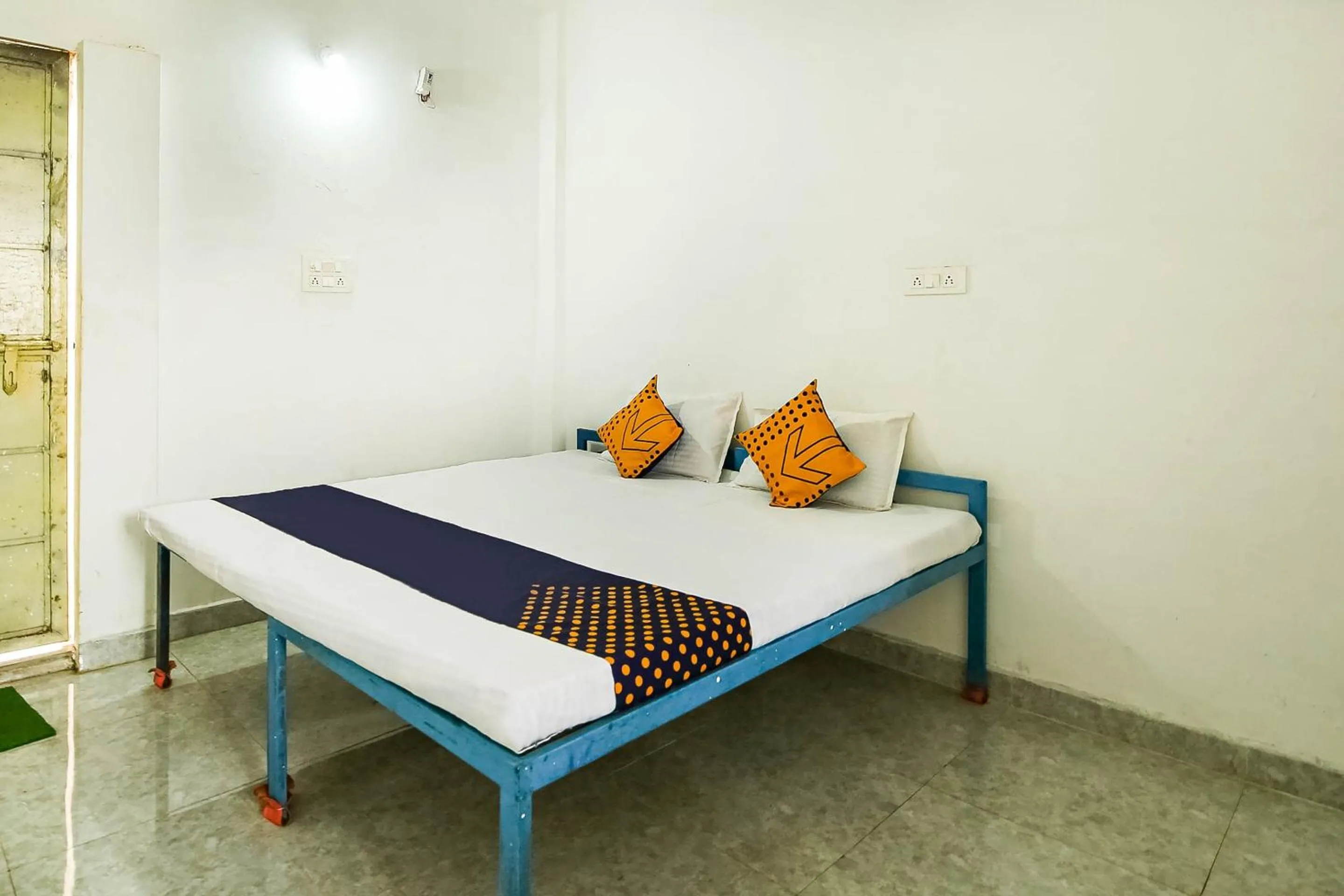 Bedroom, Bed in SPOT ON by OYO Krishna Market And Lodge