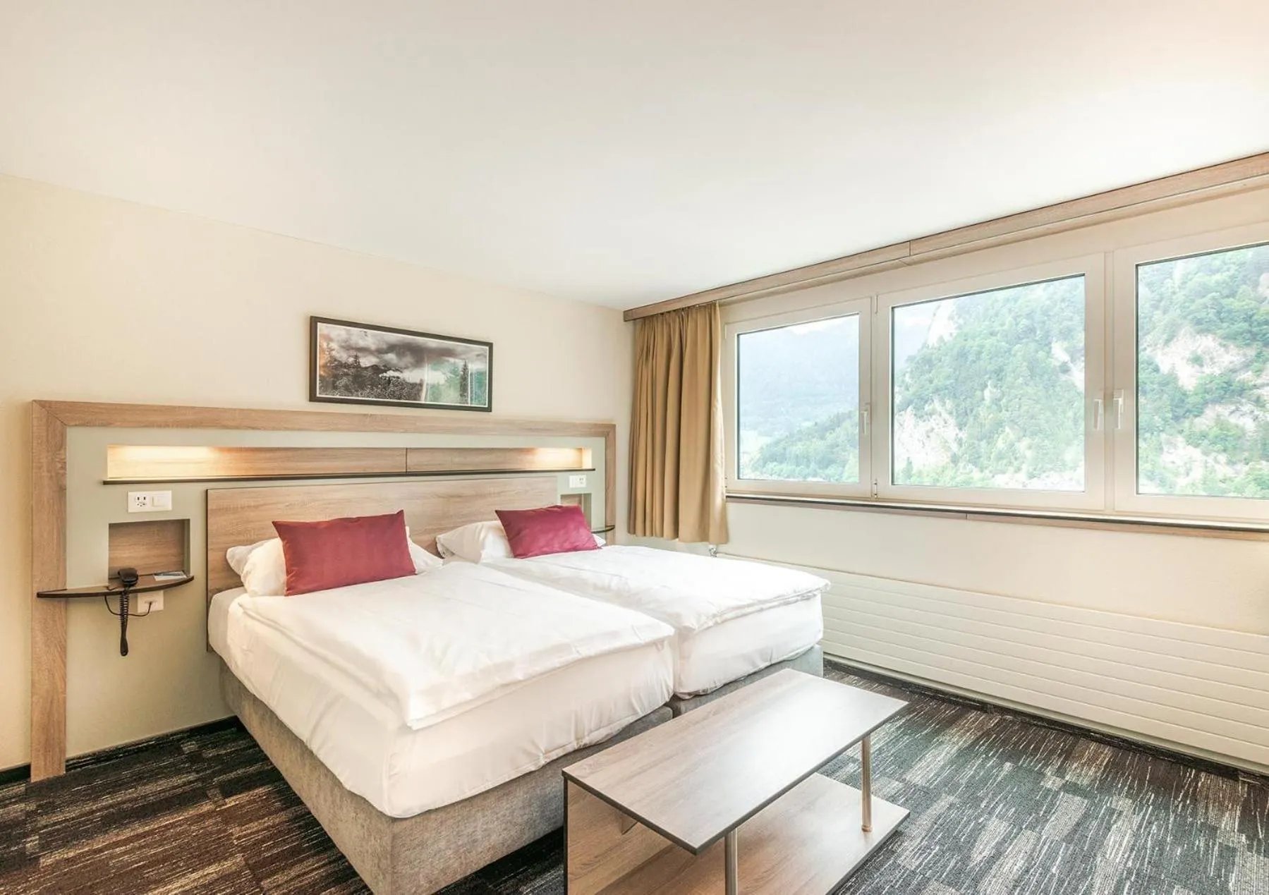 Bedroom, Bed in Hotel Metropole Interlaken