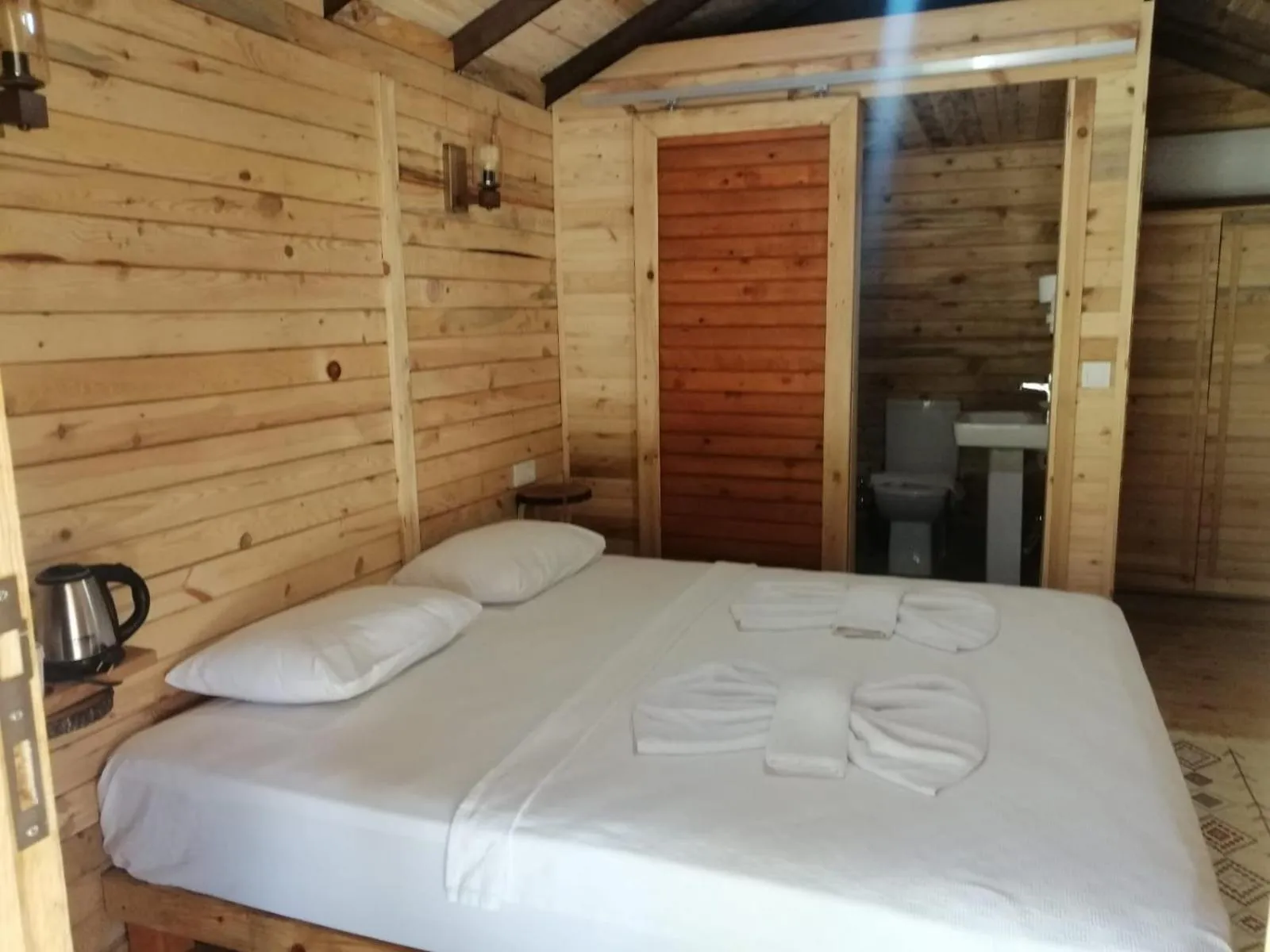 Photo of the whole room in Green Pine Bungalows & Beach Luxury Concept