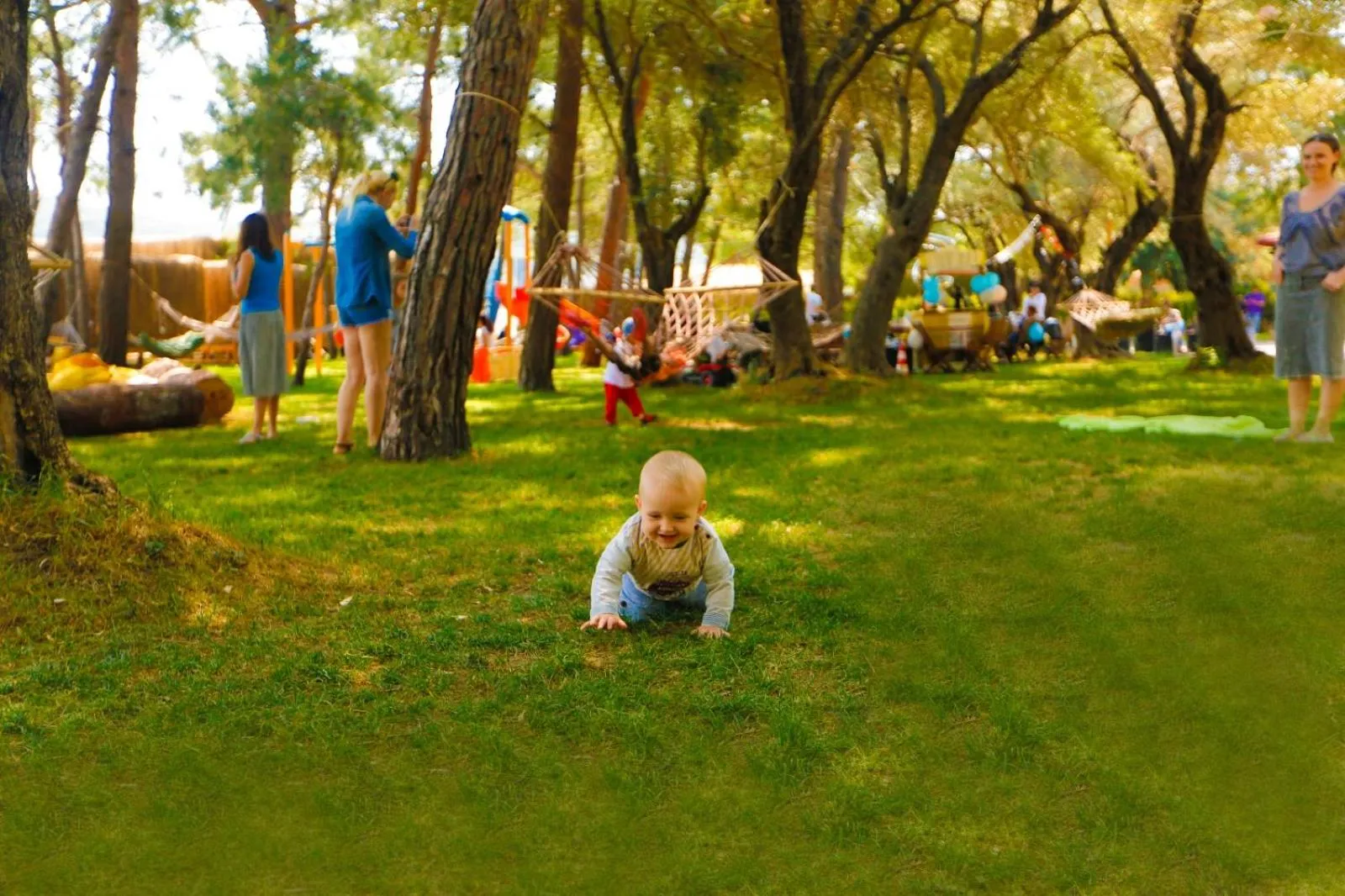 People in Green Pine Bungalows & Beach Luxury Concept