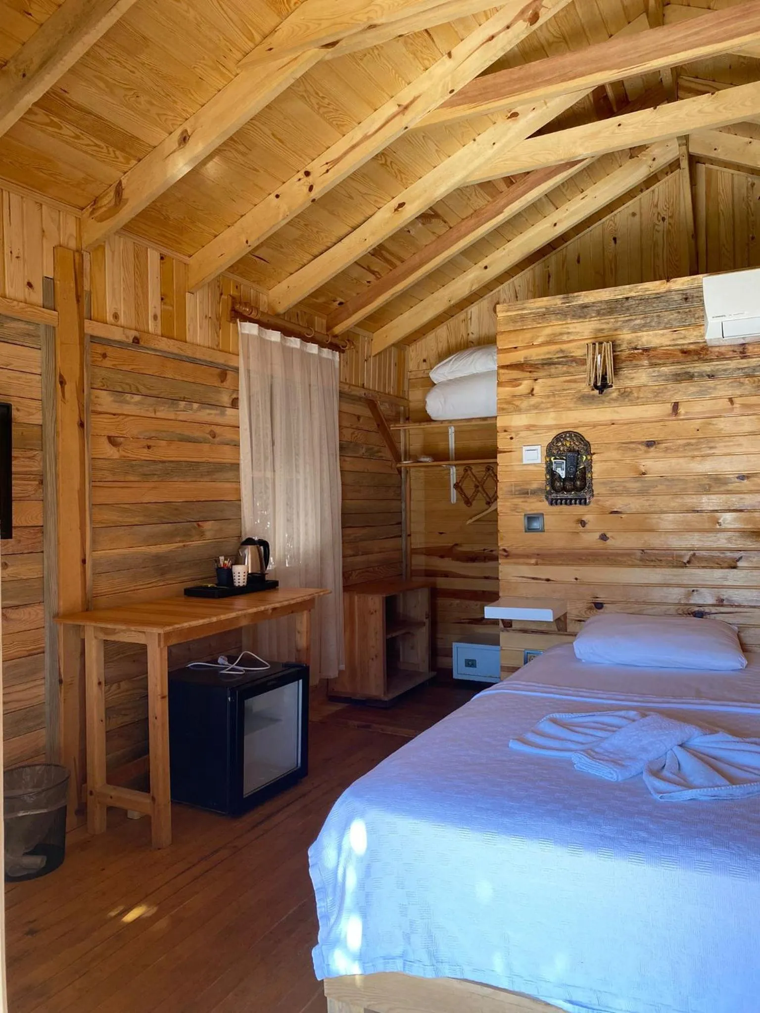 TV and multimedia in Green Pine Bungalows & Beach Luxury Concept