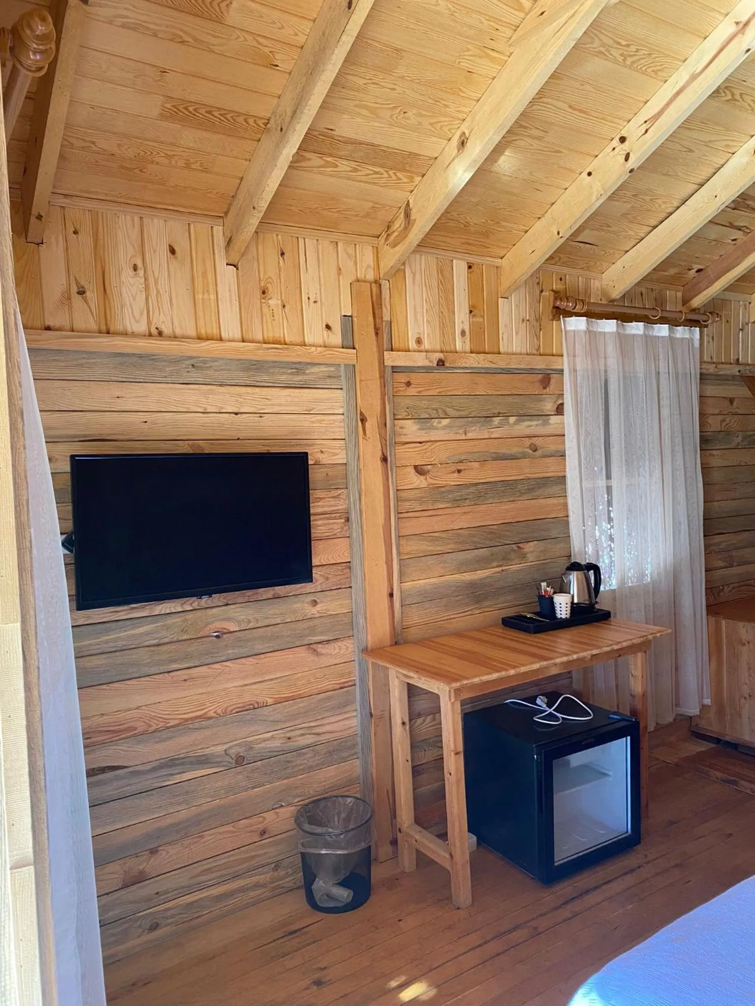 Bed in Green Pine Bungalows & Beach Luxury Concept