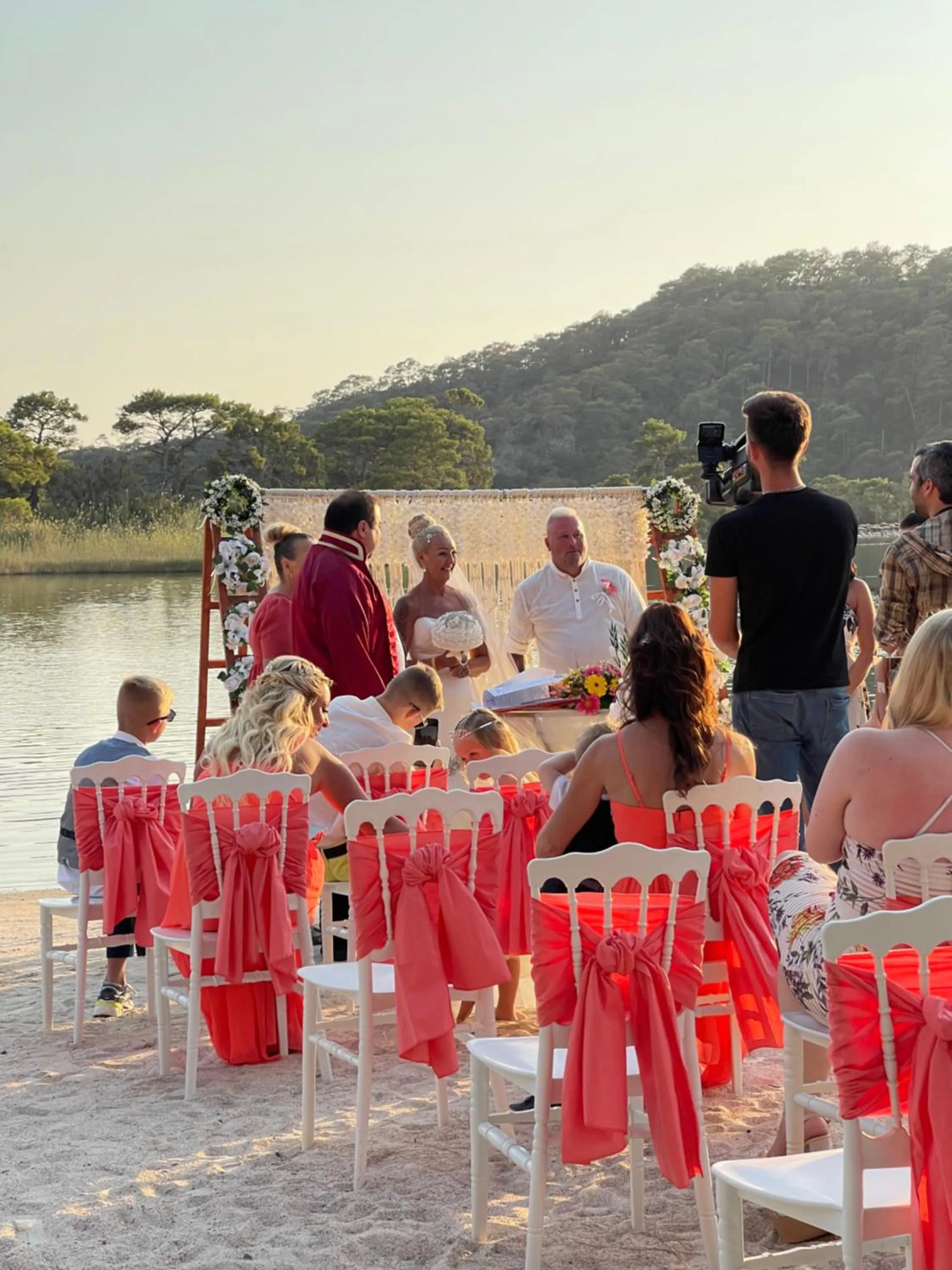 People in Green Pine Bungalows & Beach Luxury Concept