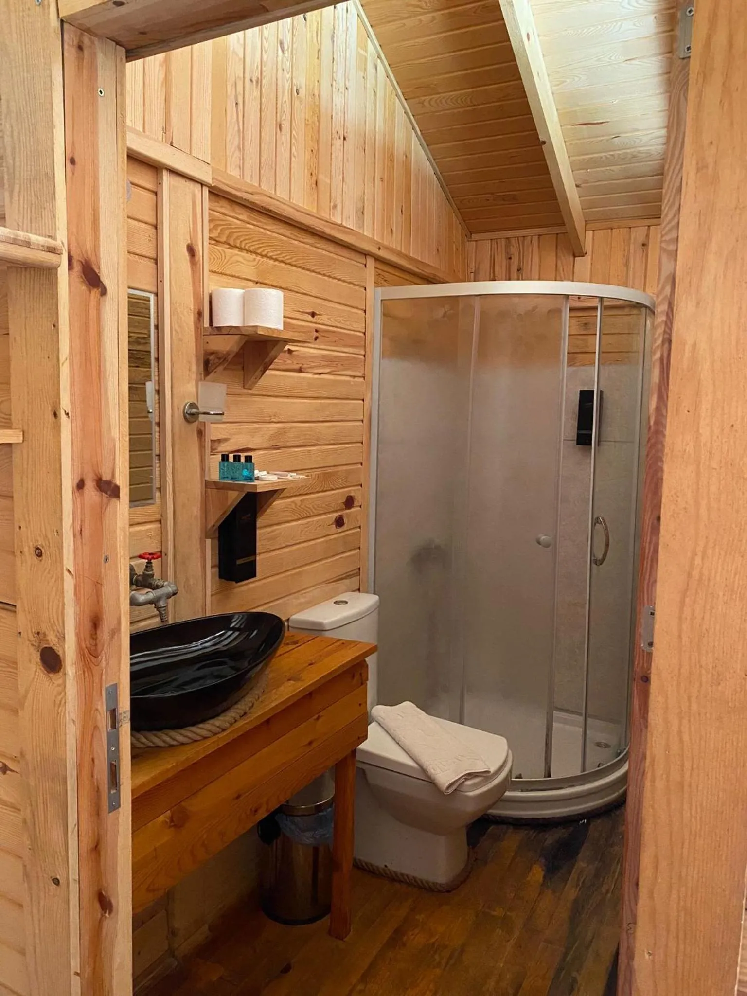 Shower in Green Pine Bungalows & Beach Luxury Concept