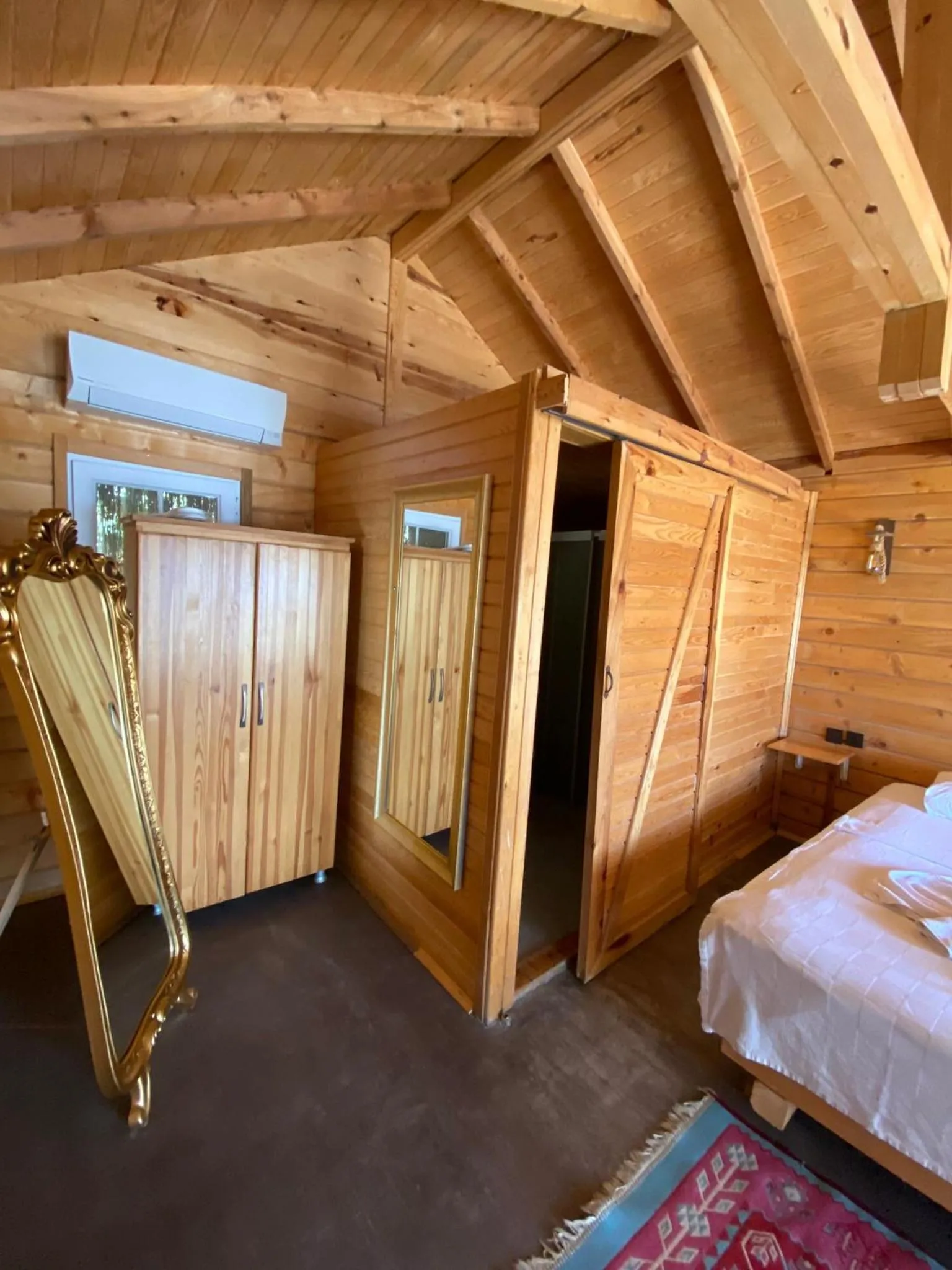 Bed in Green Pine Bungalows & Beach Luxury Concept