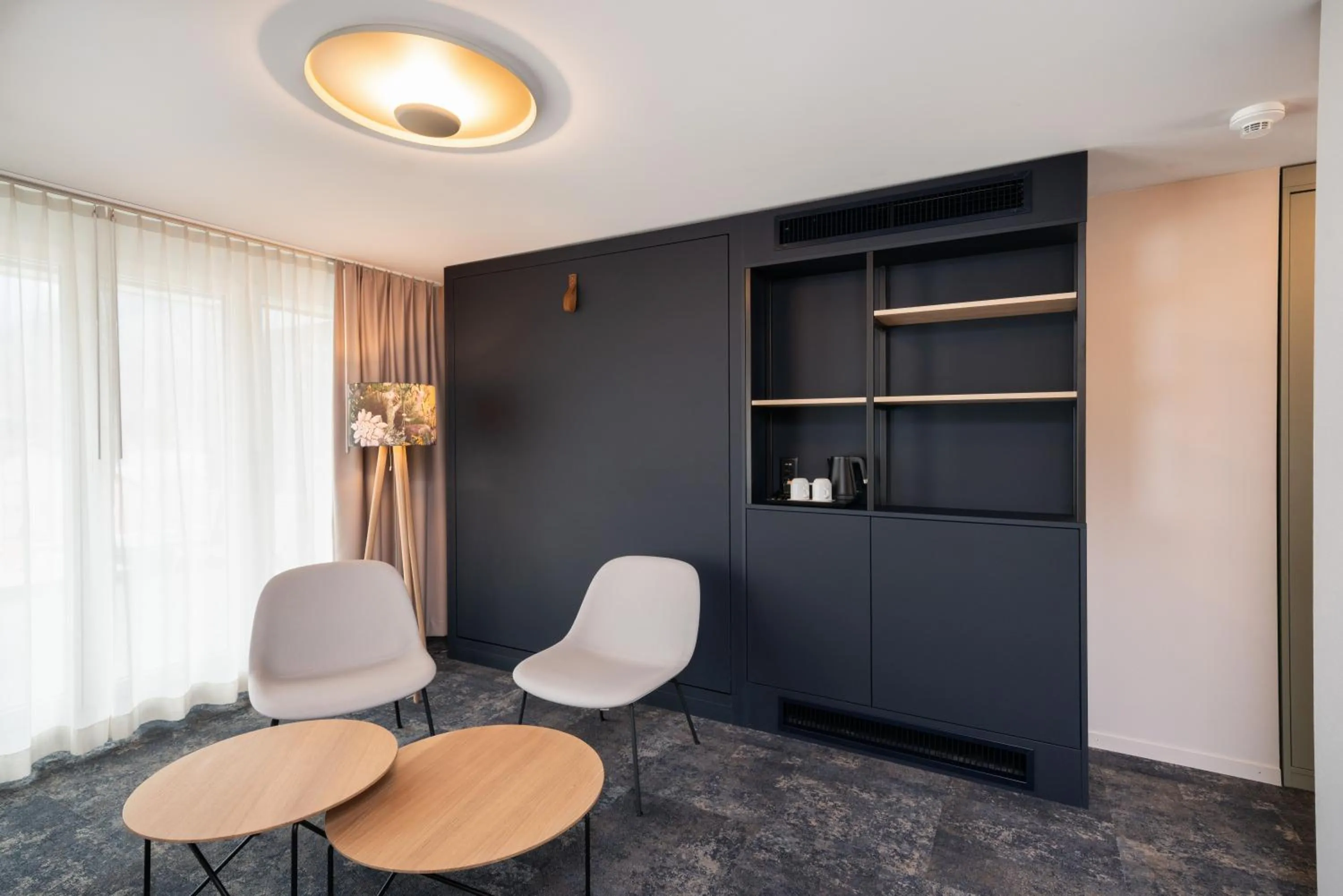 Living room in Stella Swiss Quality Hotel