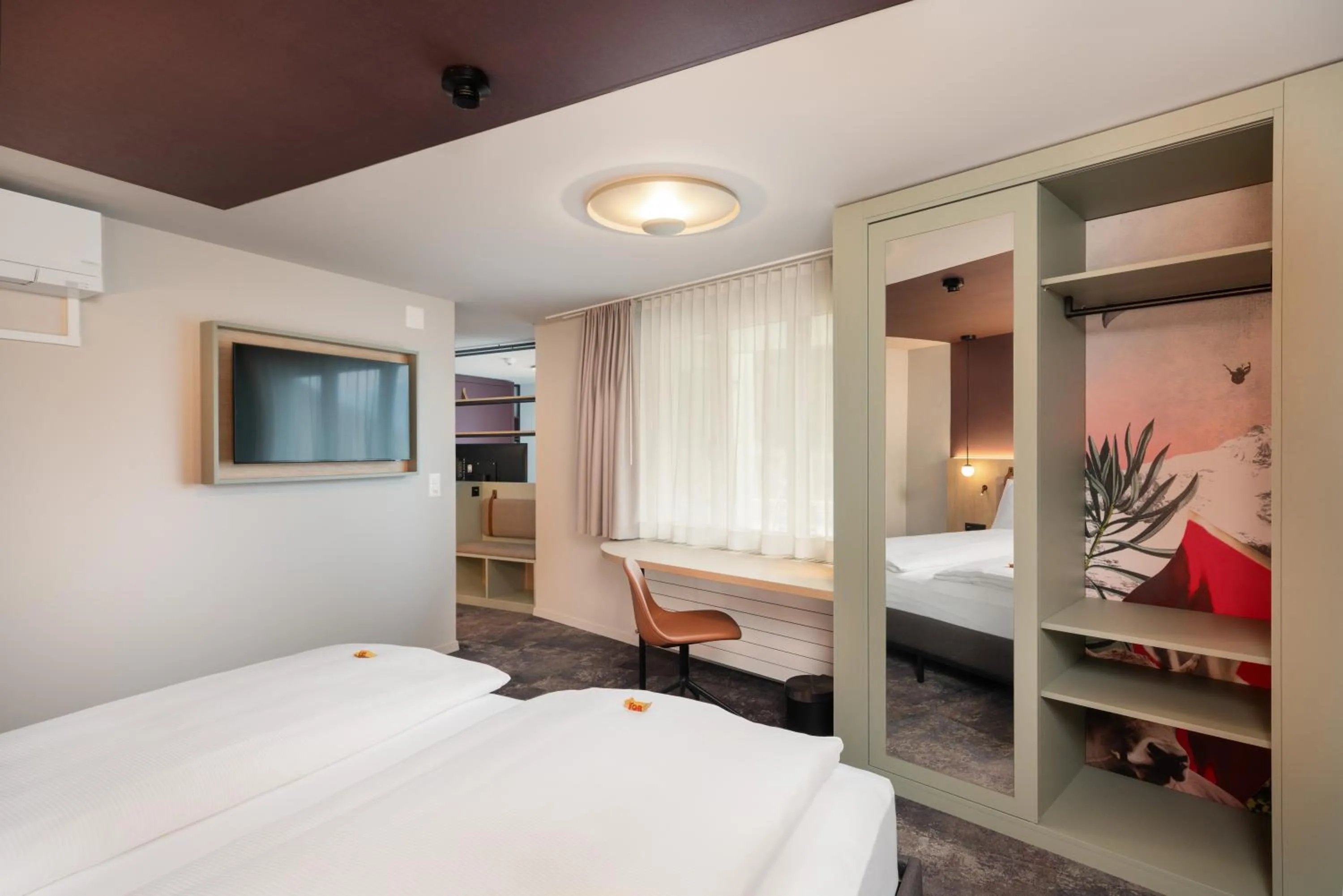 Bed in Stella Swiss Quality Hotel