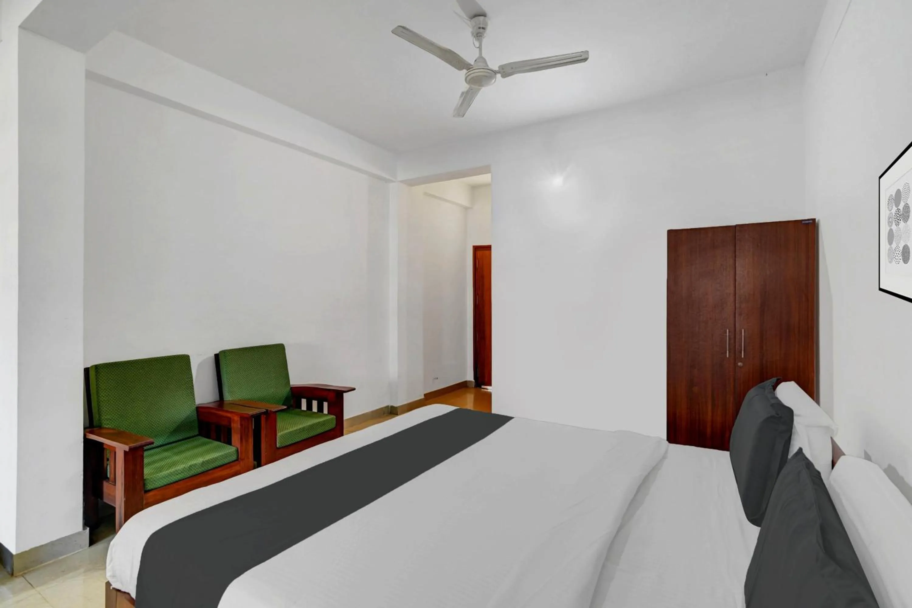 Bedroom, Bed in Super Collection O Madikeri City Center Near KSRTC Bus Stand Coorg Formerly Hotel Ragsys